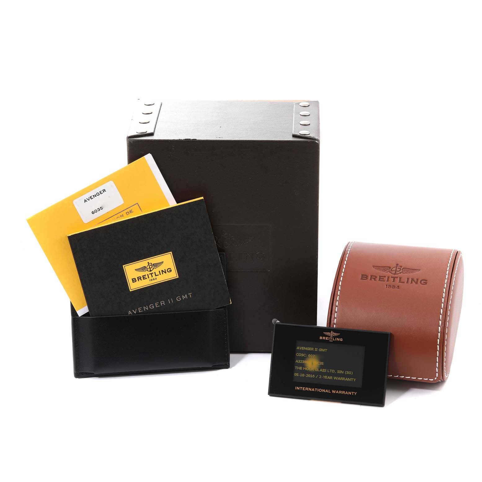 The image shows the packaging, warranty card, manuals, and leather case for the Breitling Avenger A32390 Men's Stainless Steel Black Dial A32390 Men's Stainless Steel Black Dial watch model.