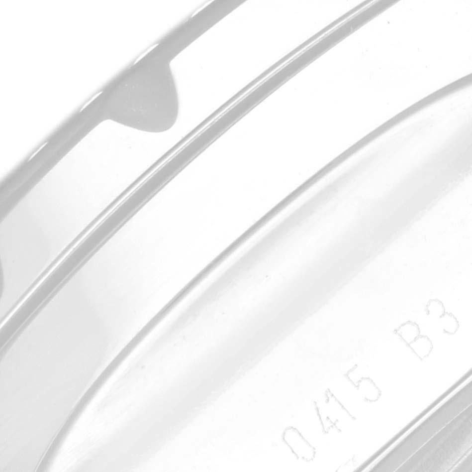 The image shows a close-up of the outer edge of the case back of a Breitling Bentley A1336212/A726 Men's Stainless Steel White Dial A1336212/A726 Men's Stainless Steel White Dial model watch, featuring some engraved numbers.