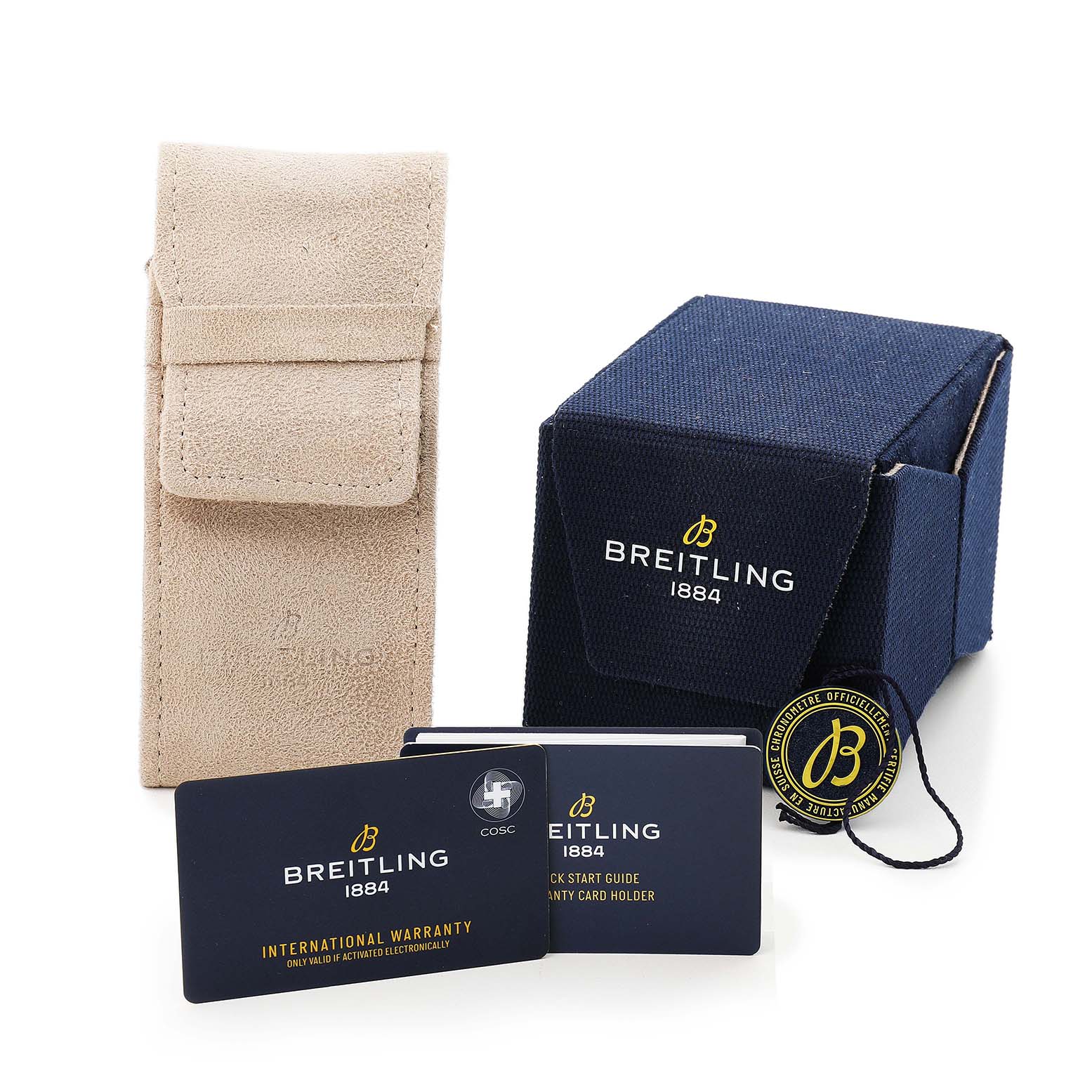 The image shows the Breitling Aviator A23380 Men's Stainless Steel Black Dial watch accessories, including a beige suede pouch, a blue box, warranty cards, and manuals.
