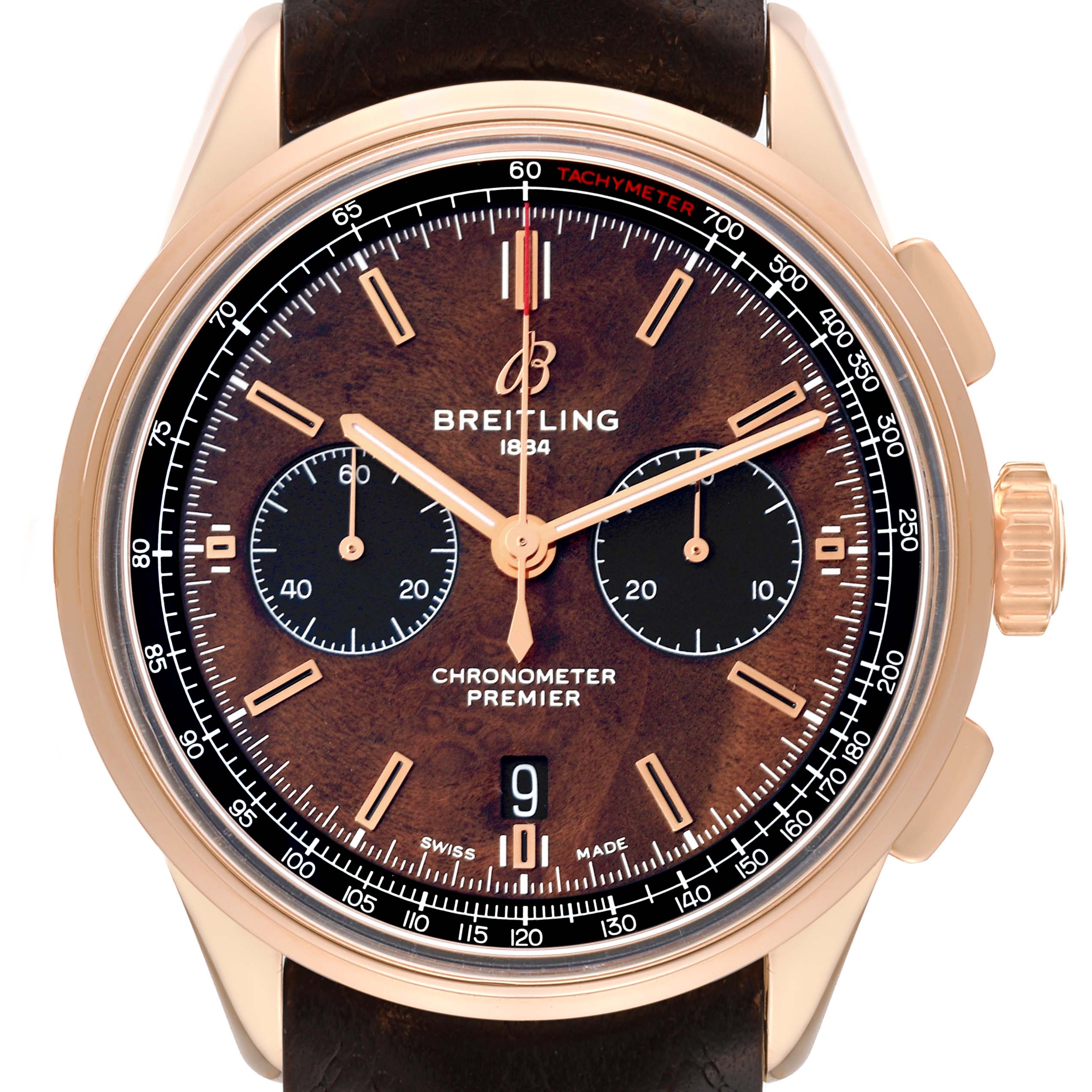The Breitling Premier RB01181A1Q1X1 Men's Rose Gold Brown Dial RB01181A1Q1X1 Men's Rose Gold Brown Dial watch is shown from the front, highlighting its dial, sub-dials, tachymeter, and brown leather strap.