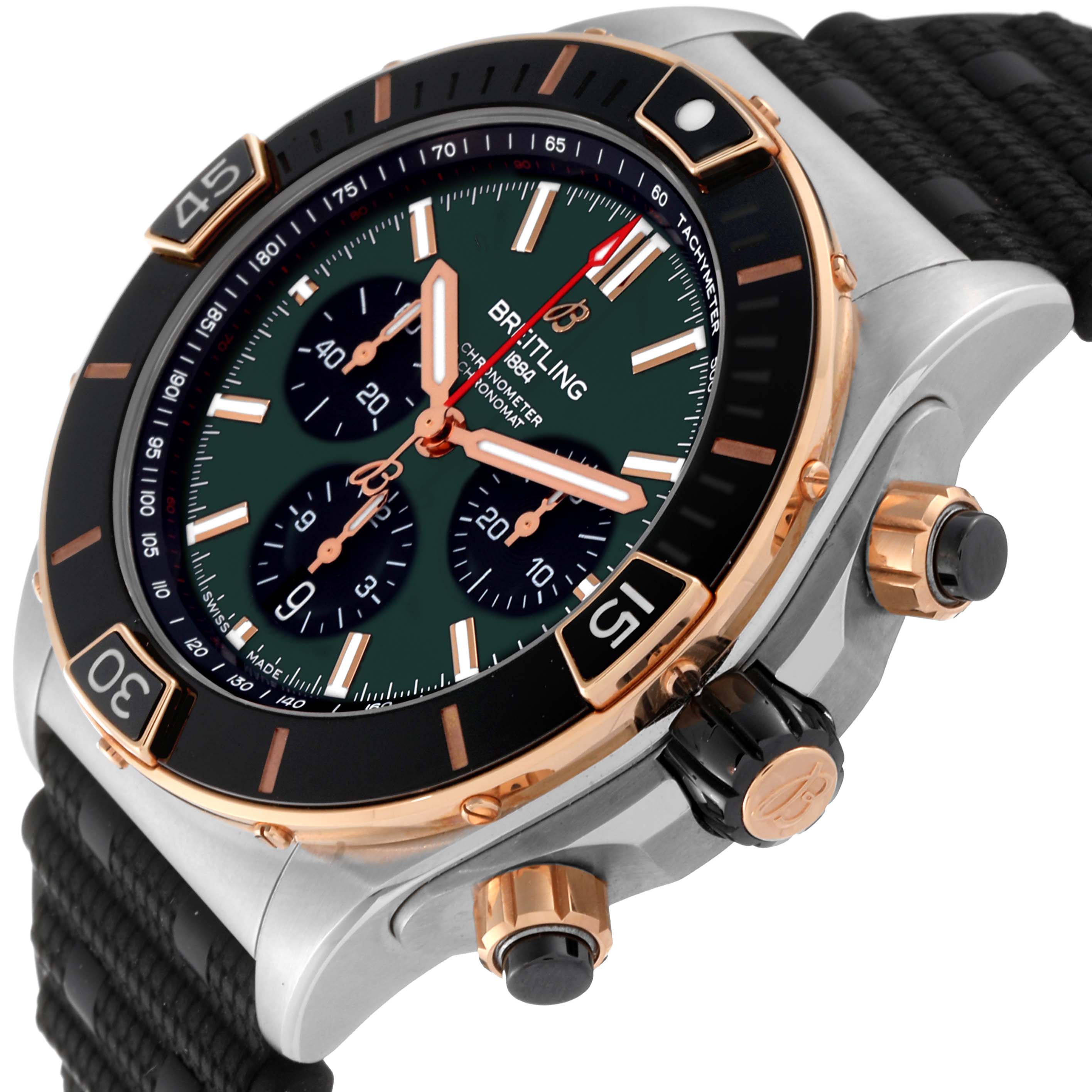 The Breitling Chronomat UB0136251L1S1 Men's Steel and Gold (two tone) Green Dial UB0136251L1S1 Men's Steel and Gold (two tone) Green Dial watch is shown at an angled close-up view, highlighting its dial, bezel, crown, and strap.