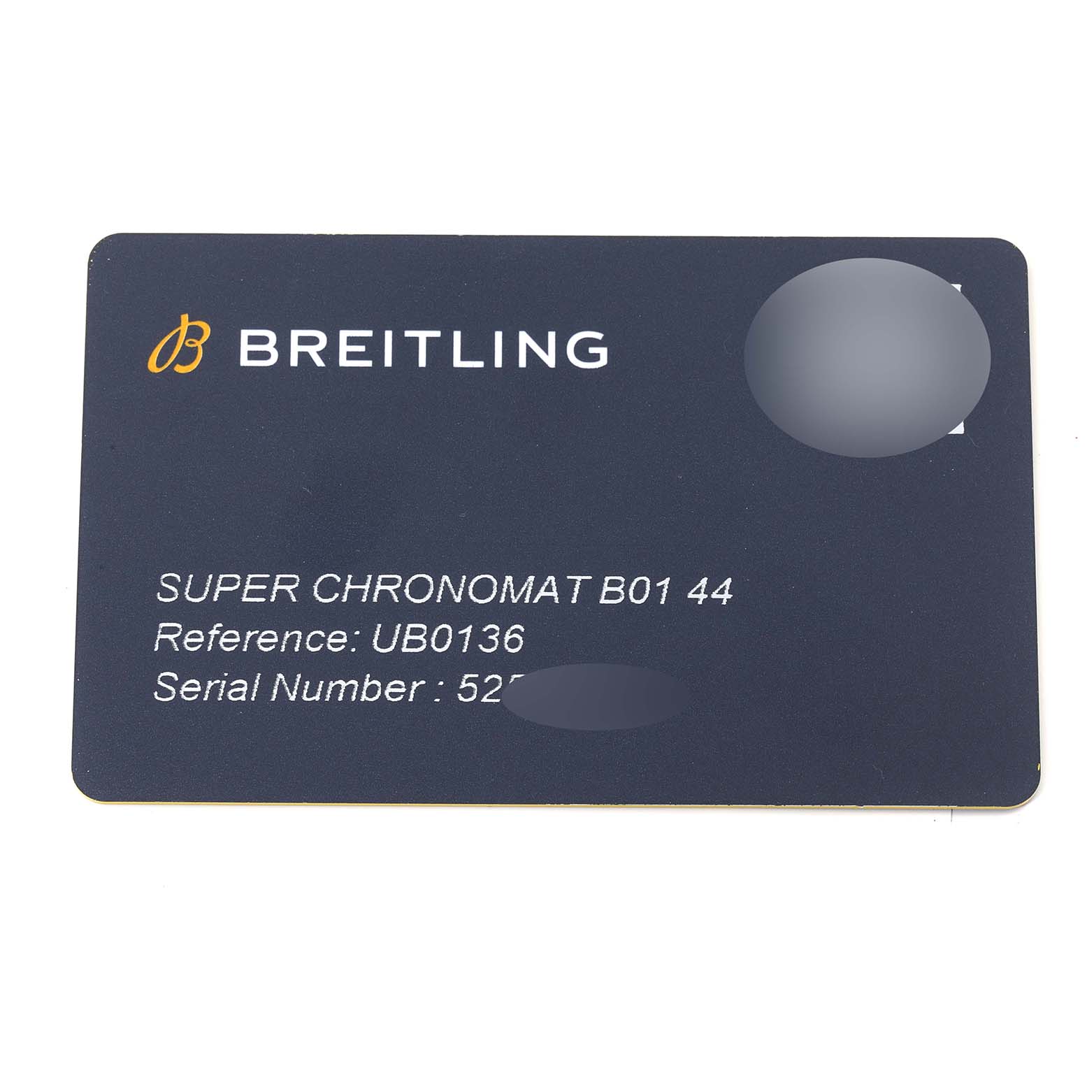 This image shows a Breitling Chronomat UB0136251L1S1 Men's Steel and Gold (two tone) Green Dial UB0136251L1S1 Men's Steel and Gold (two tone) Green Dial model warranty card with the model and serial numbers visible.