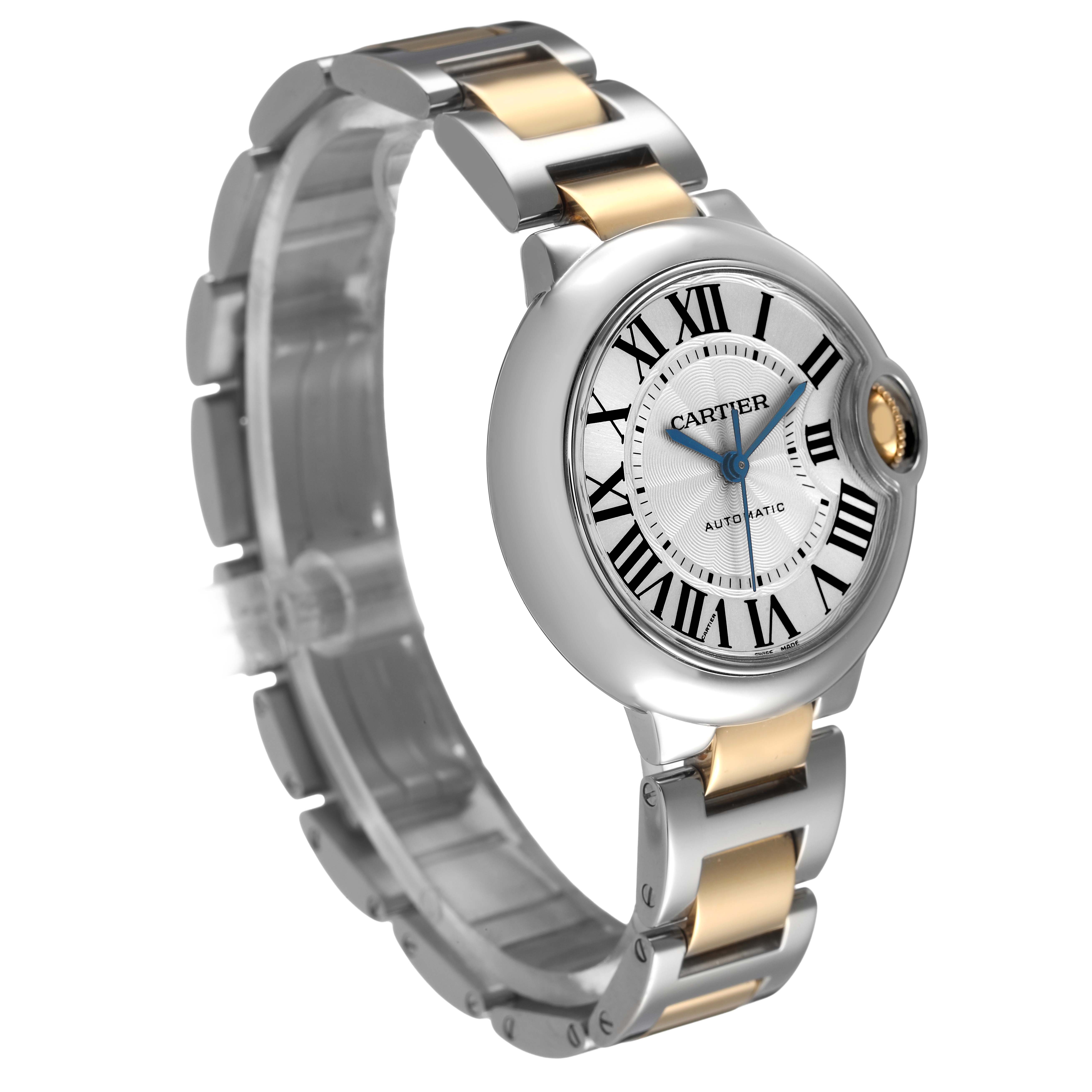 The Cartier Ballon Bleu W2BB0002 Women's Stainless Steel Silver Dial watch is shown at a three-quarter angle, highlighting the face, roman numerals, blue hands, and two-tone bracelet.