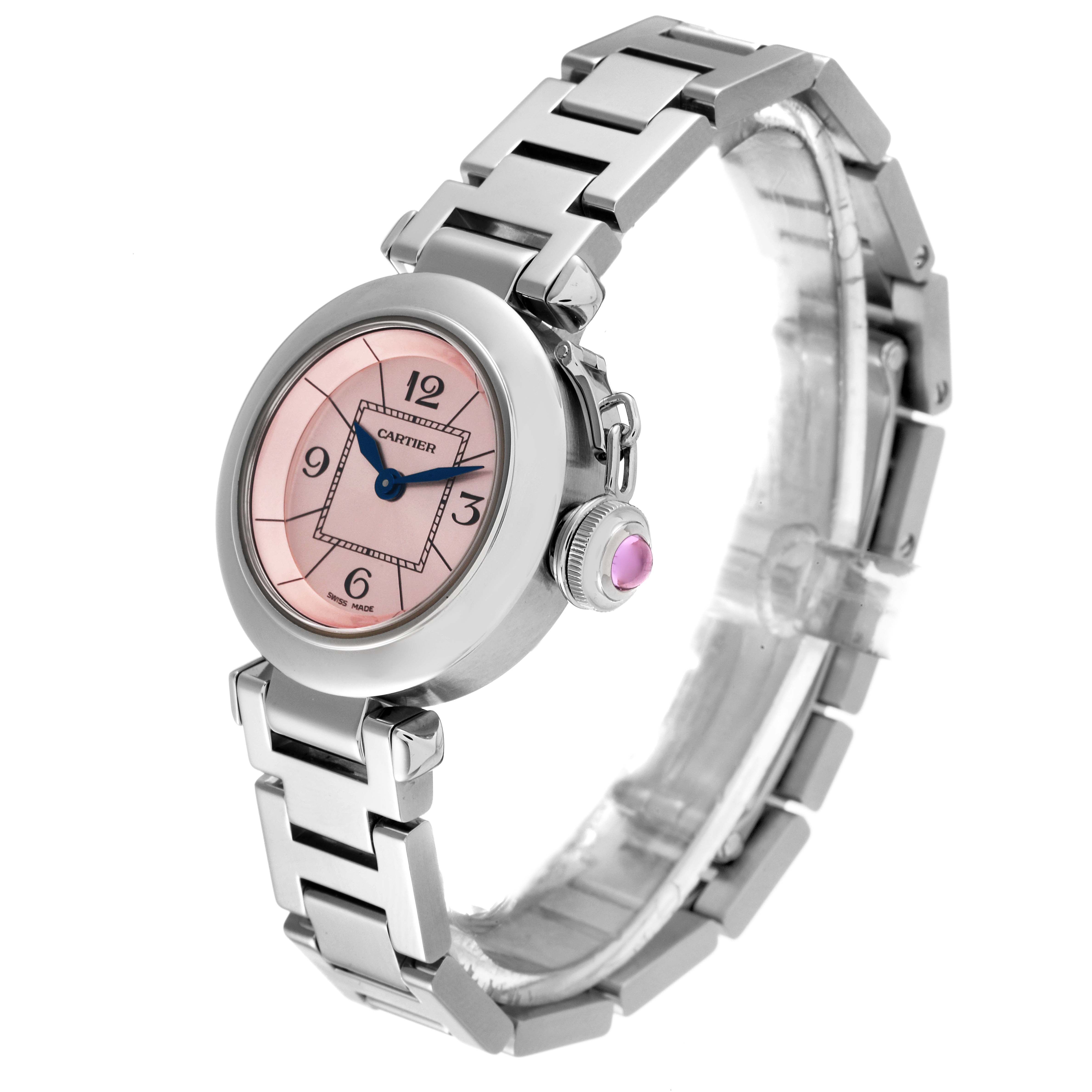 The image shows a side angle view of the Cartier Pasha W3140008 Women's Stainless Steel Pink Dial W3140008 Women's Stainless Steel Pink Dial watch, highlighting its pink dial, metal bracelet, and crown with a pink gemstone.