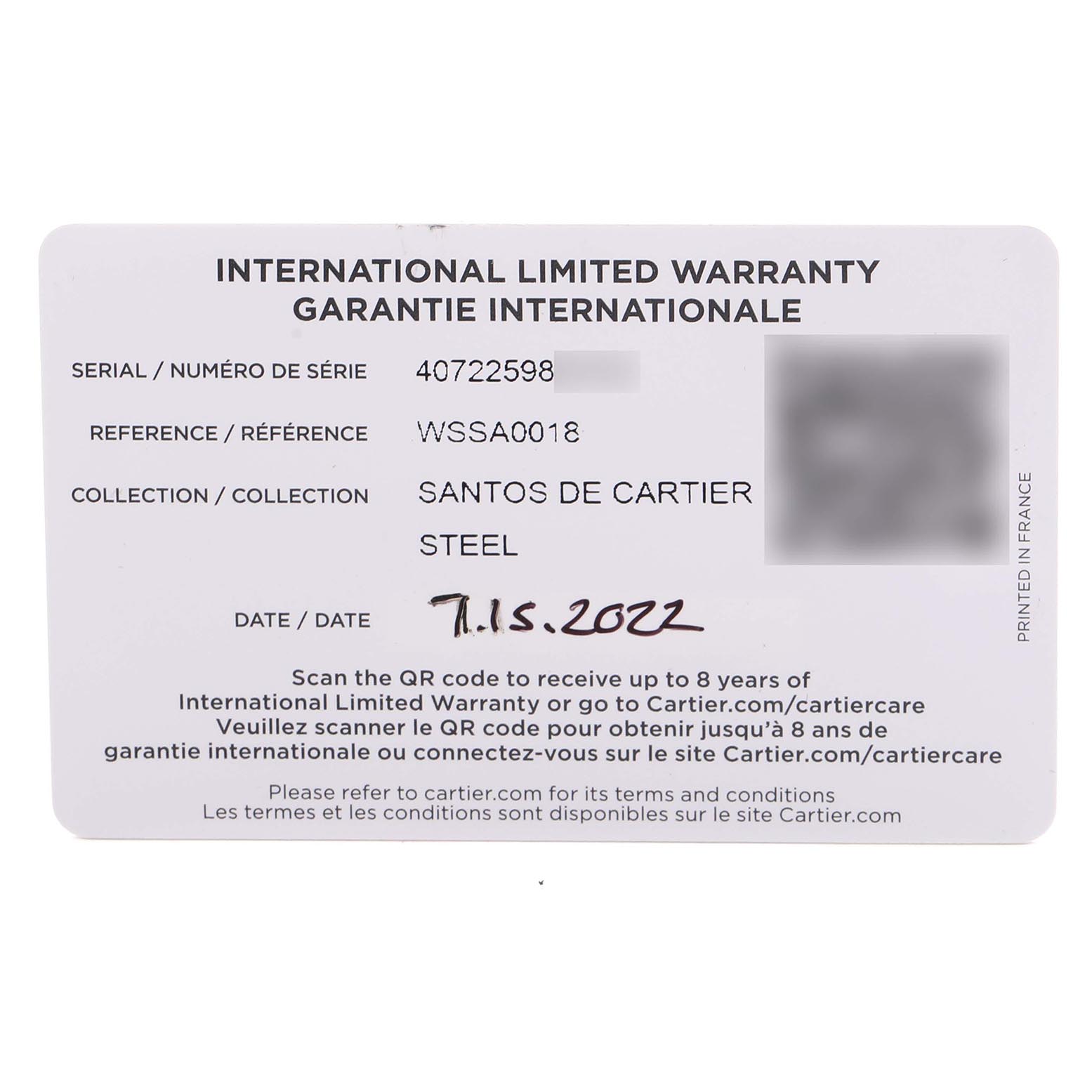 This image shows an International Limited Warranty card for the Santos de Cartier watch model, displaying serial, reference numbers, and date.