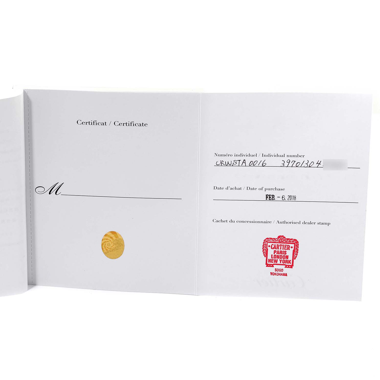 The image shows a certificate booklet for the Cartier Tank Americaine WSTA0016 Women's Stainless Steel Silver Dial WSTA0016 Women's Stainless Steel Silver Dial watch, displaying the purchase date and red dealer stamp.