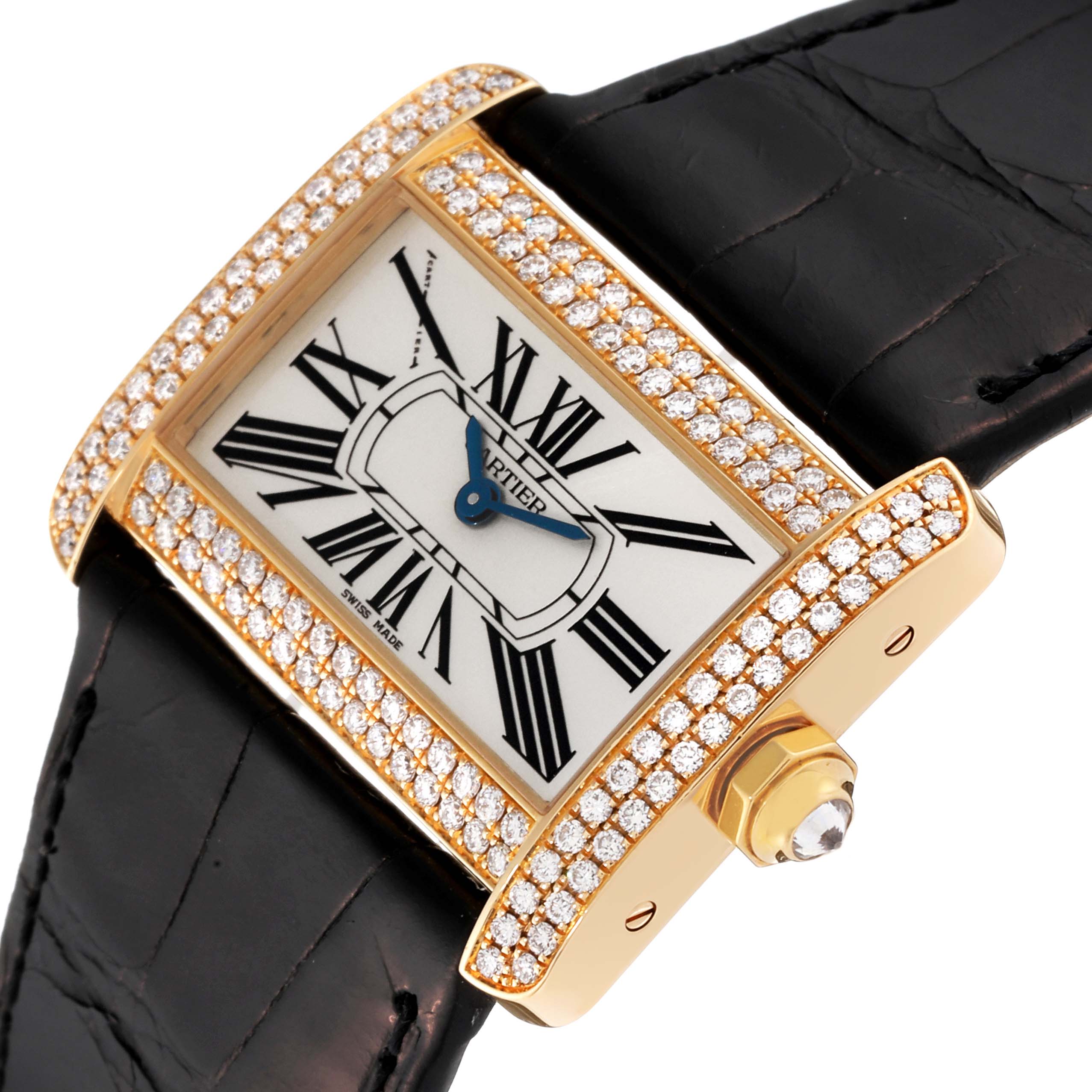 This image shows the Cartier Tank Divan WA301036 Women's Yellow Gold Silver Dial WA301036 Women's Yellow Gold Silver Dial watch at an angled close-up, highlighting its diamond-studded bezel and black leather strap.