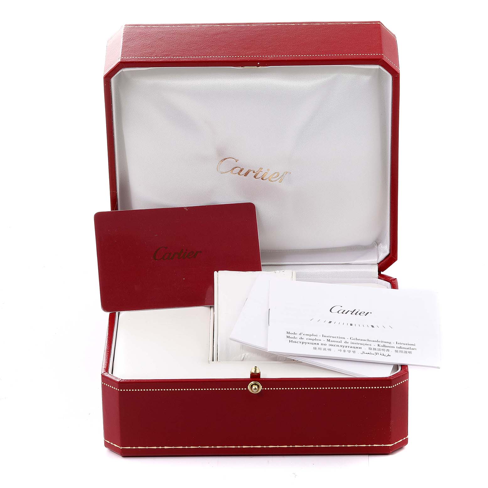 The image shows the open box for the Tank Louis model by Cartier, including warranty cards and booklets.