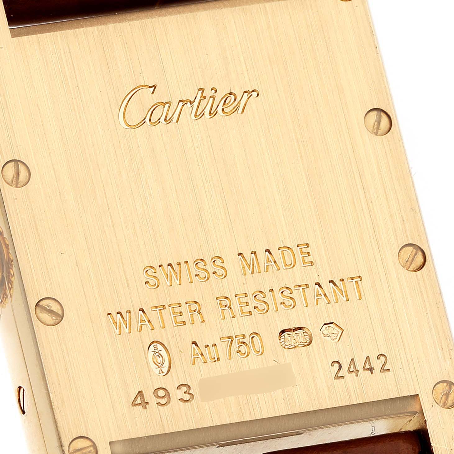 The image shows the back case of the Cartier Tank Louis W1529856 Women's Yellow Gold Silver Dial W1529856 Women's Yellow Gold Silver Dial watch, highlighting engravings and materials.