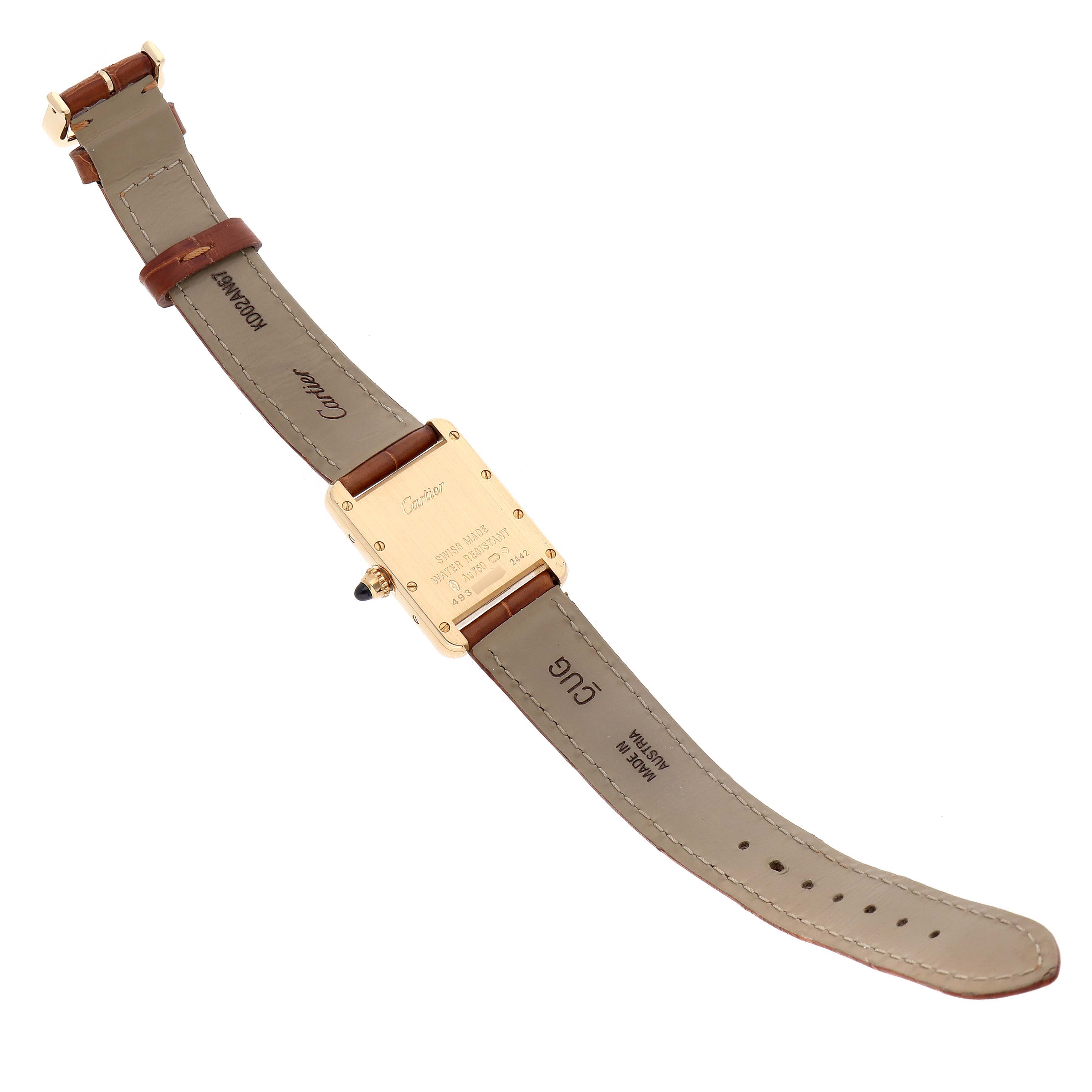 The image shows the back view of a Tank Louis model by Cartier, displaying the watch case, crown, and leather straps.