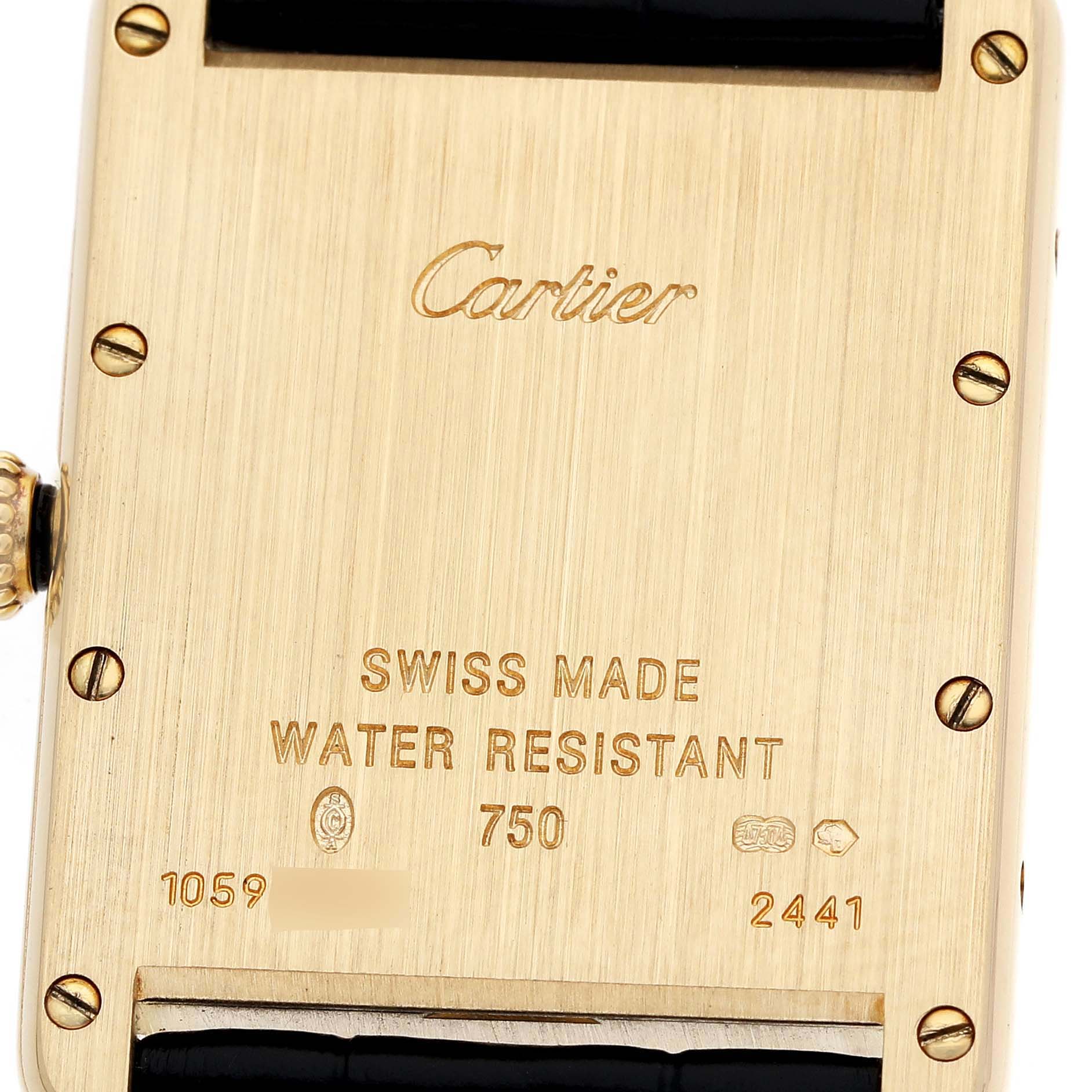 The image shows the back of a Cartier Tank Louis W1529756 Men's Yellow Gold Silver Dial watch, highlighting engravings and the strap attachment.