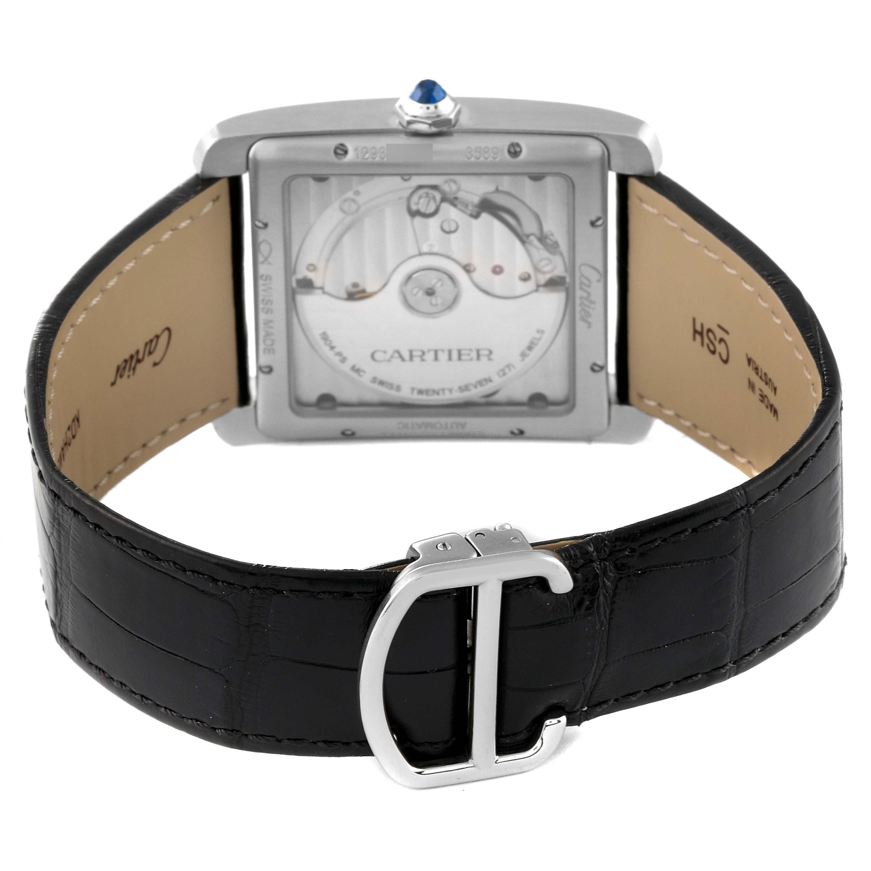 The image shows the back of the Cartier Tank MC W5330004 Men's Stainless Steel Black Dial W5330004 Men's Stainless Steel Black Dial watch, including the movement, strap, and clasp.