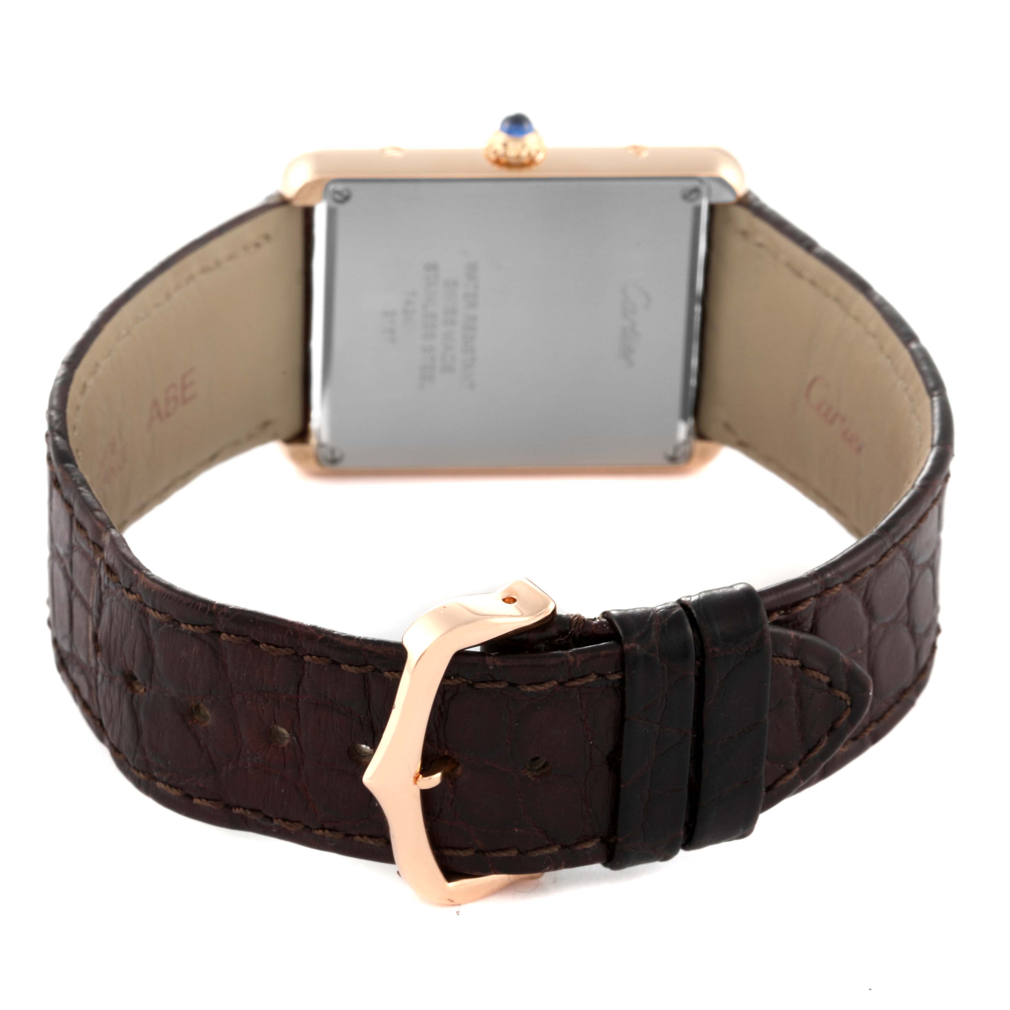 This image shows the back, case, and leather strap with buckle of a Cartier Tank Solo W5200025 Men
s Rose Gold Silver Dial W5200025 Men
s Rose Gold Silver Dial watch.