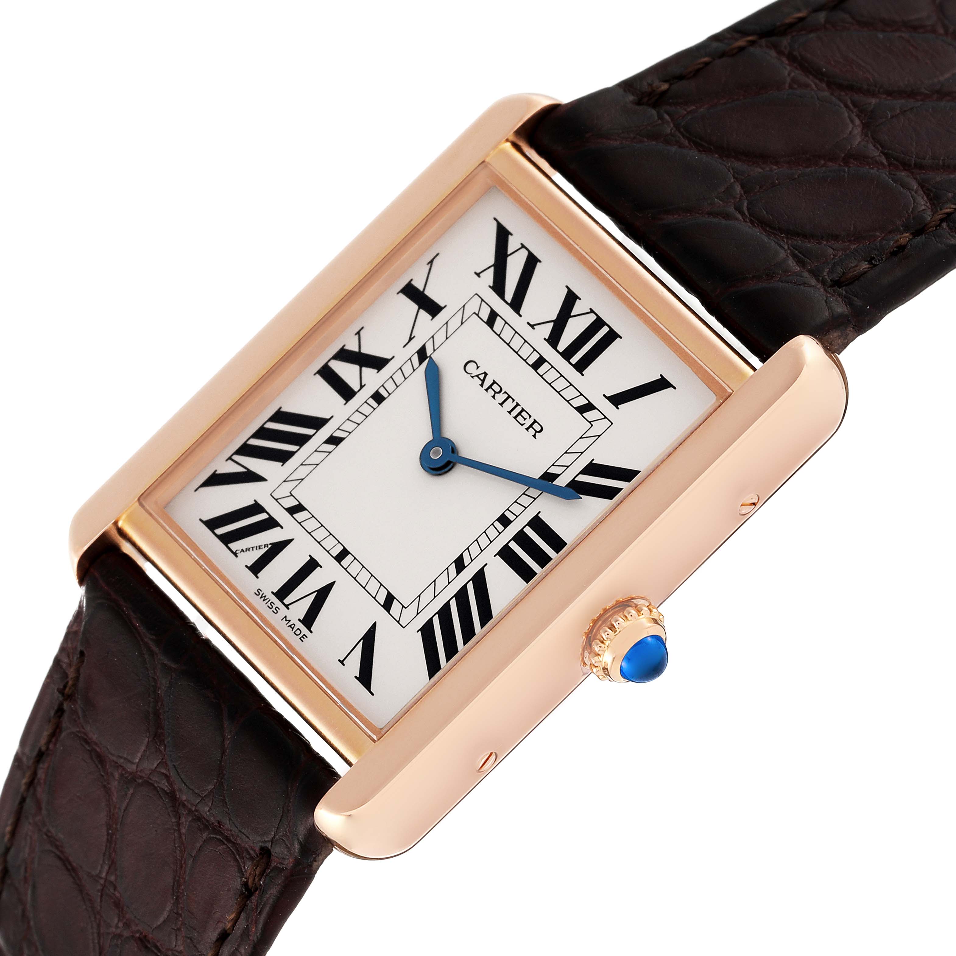 The image shows a Cartier Tank Solo W5200025 Men
s Rose Gold Silver Dial W5200025 Men
s Rose Gold Silver Dial watch at an angle highlighting its face, bezel, crown, and leather strap.