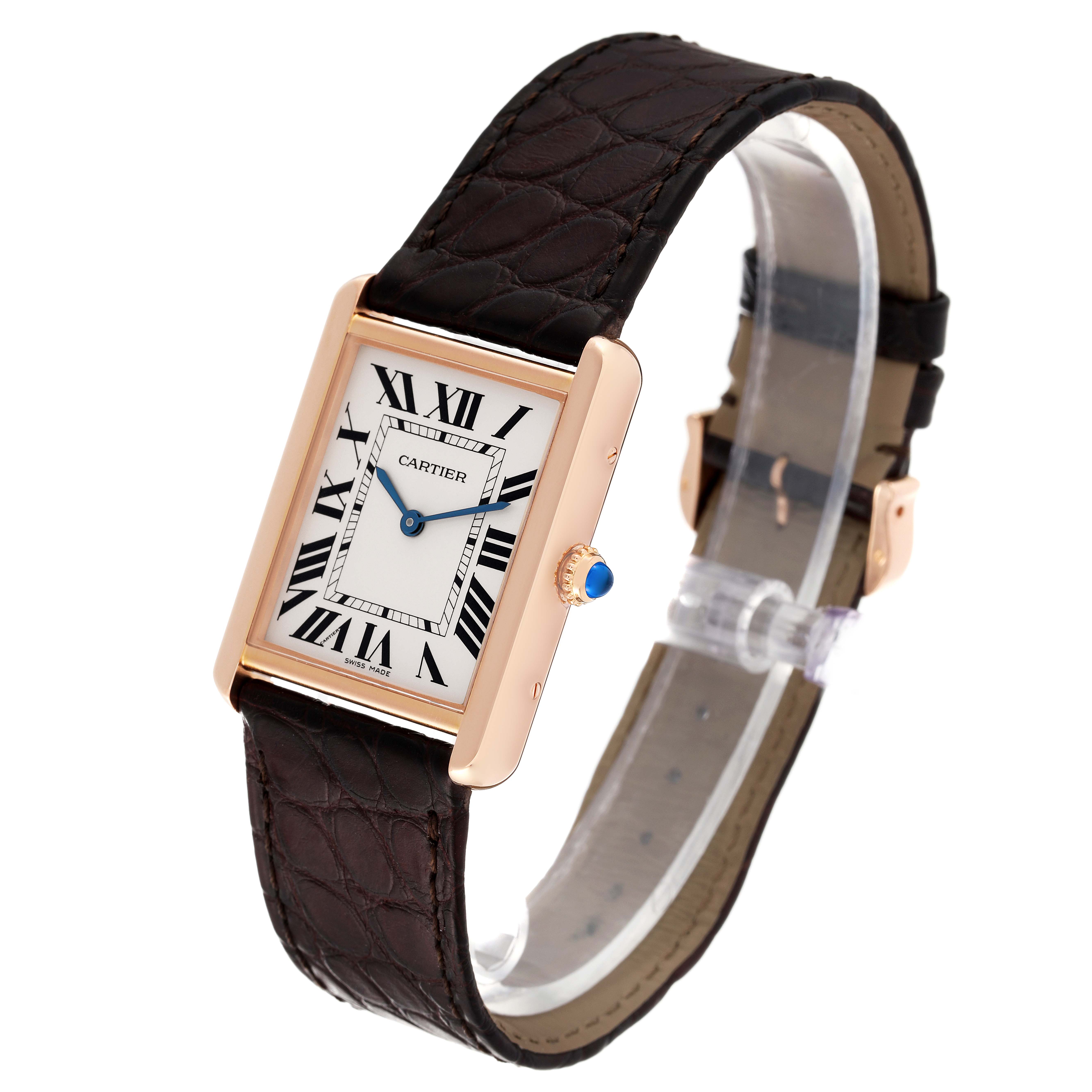 The Cartier Tank Solo W5200025 Men
s Rose Gold Silver Dial W5200025 Men
s Rose Gold Silver Dial watch is shown at an angle, highlighting its rectangular face, Roman numerals, leather strap, and crown.