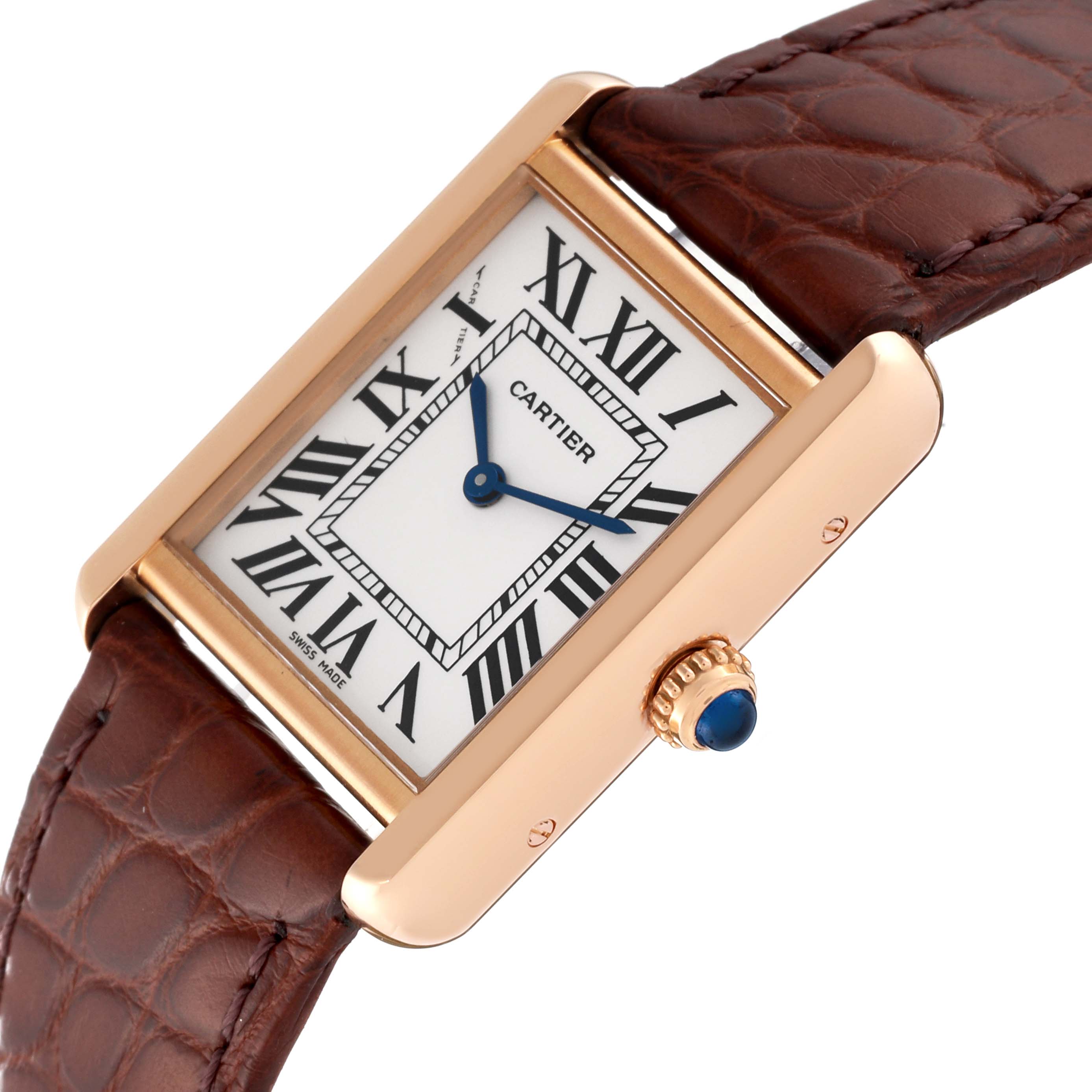 The image shows a Cartier Tank Solo W5200024 Women
s Steel and Gold (two tone) Silver Dial W5200024 Women
s Steel and Gold (two tone) Silver Dial watch at an angle, highlighting its face, Roman numerals, and brown leather strap.