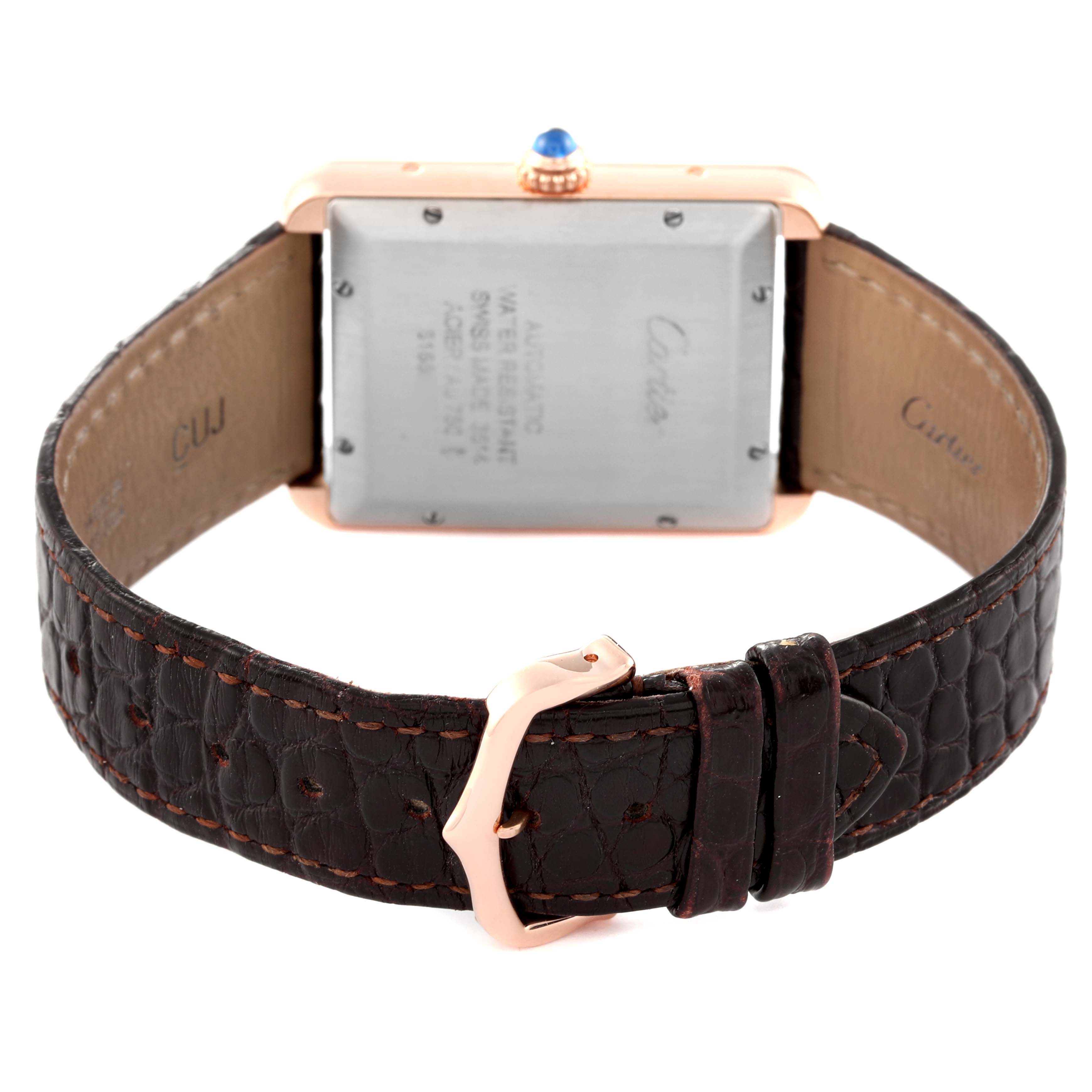 The image shows the back side of a Cartier Tank Solo W5200026 Men
s Rose Gold Silver Dial W5200026 Men
s Rose Gold Silver Dial watch, featuring its leather strap and buckle.