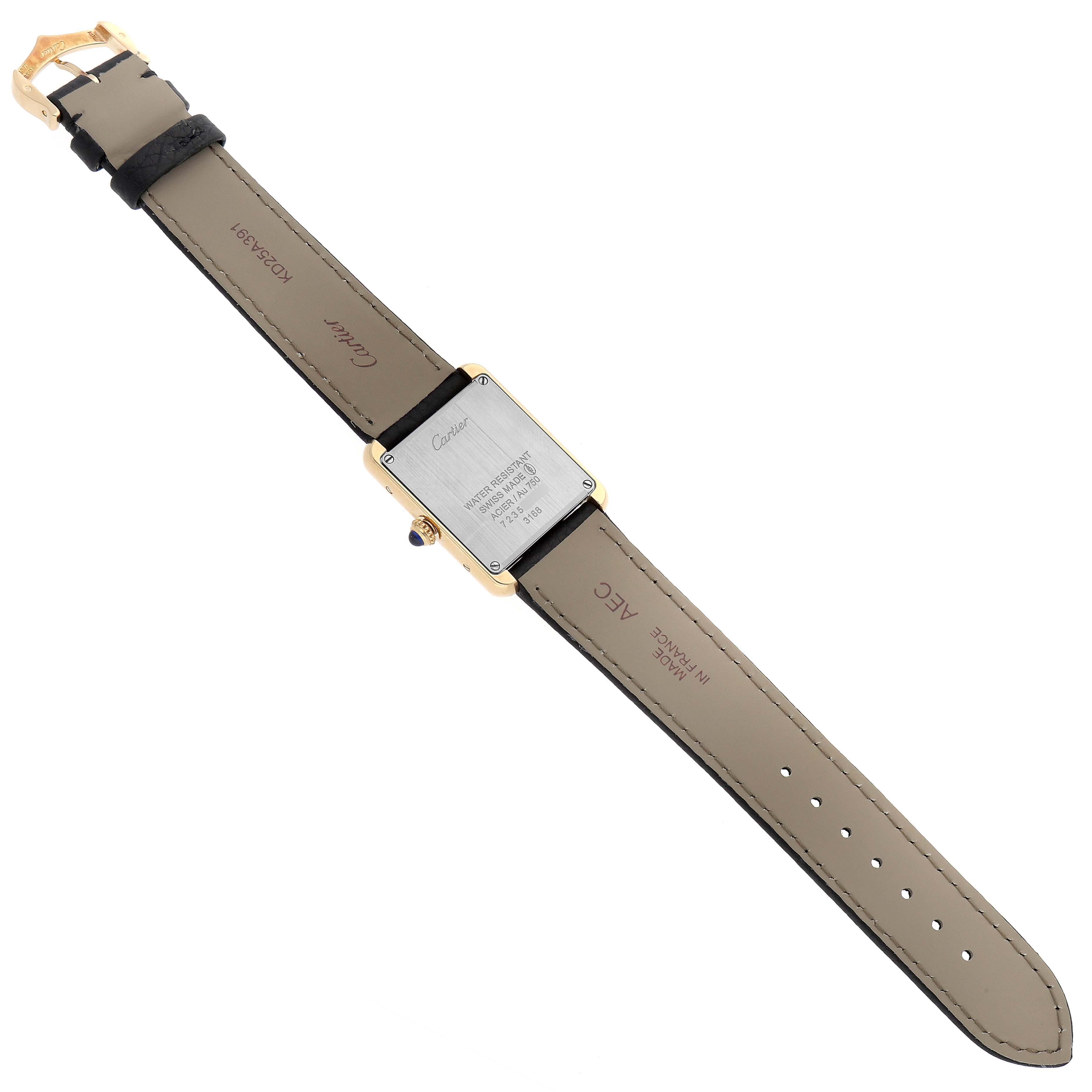 The image shows the rear view of the Cartier Tank Solo W5200002 Women
s Steel and Gold (two tone) Silver Dial W5200002 Women
s Steel and Gold (two tone) Silver Dial watch, including the watch case back, strap, and buckle.