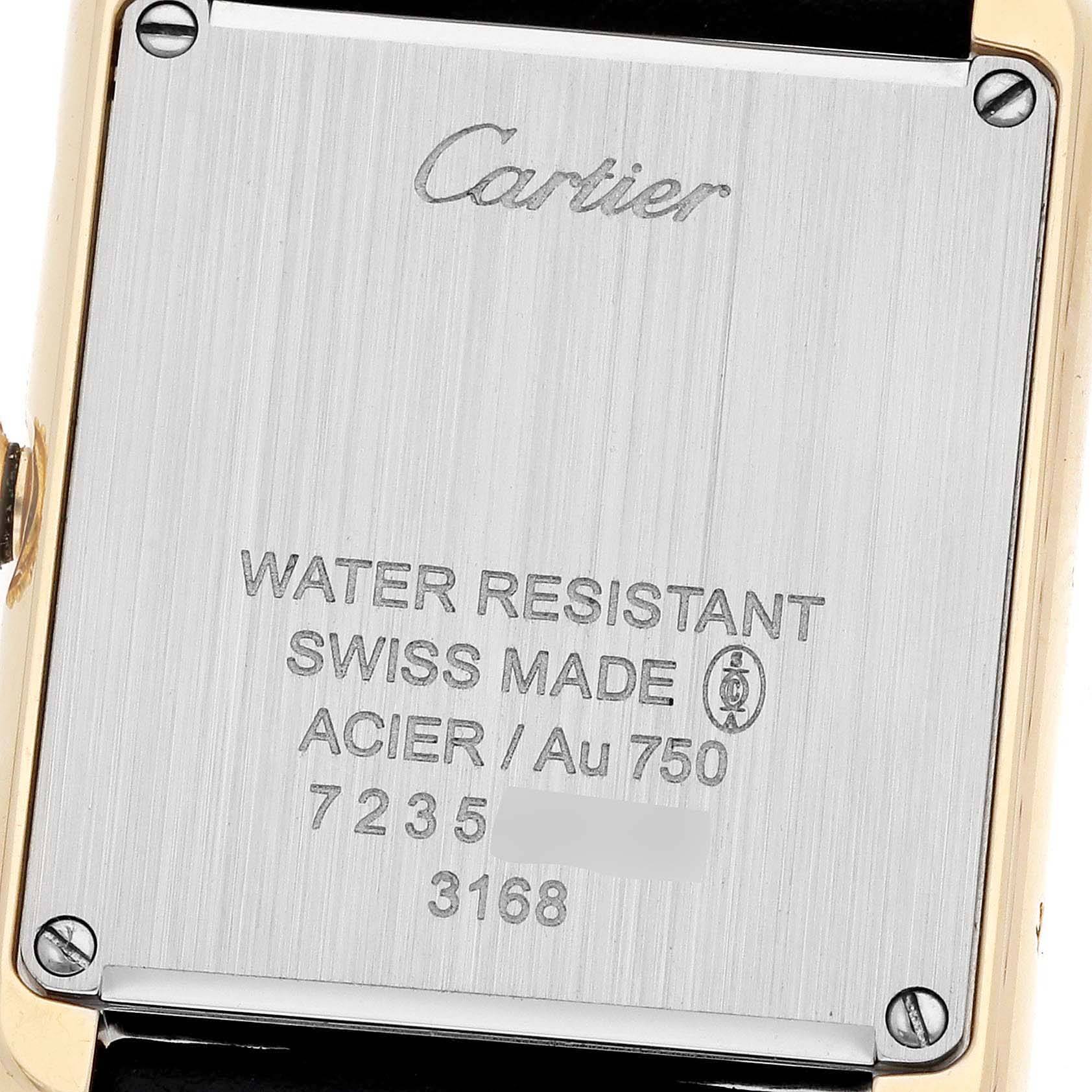This image shows the back case of a Cartier Tank Solo W5200002 Women
s Steel and Gold (two tone) Silver Dial W5200002 Women
s Steel and Gold (two tone) Silver Dial watch, displaying various engravings about its features.