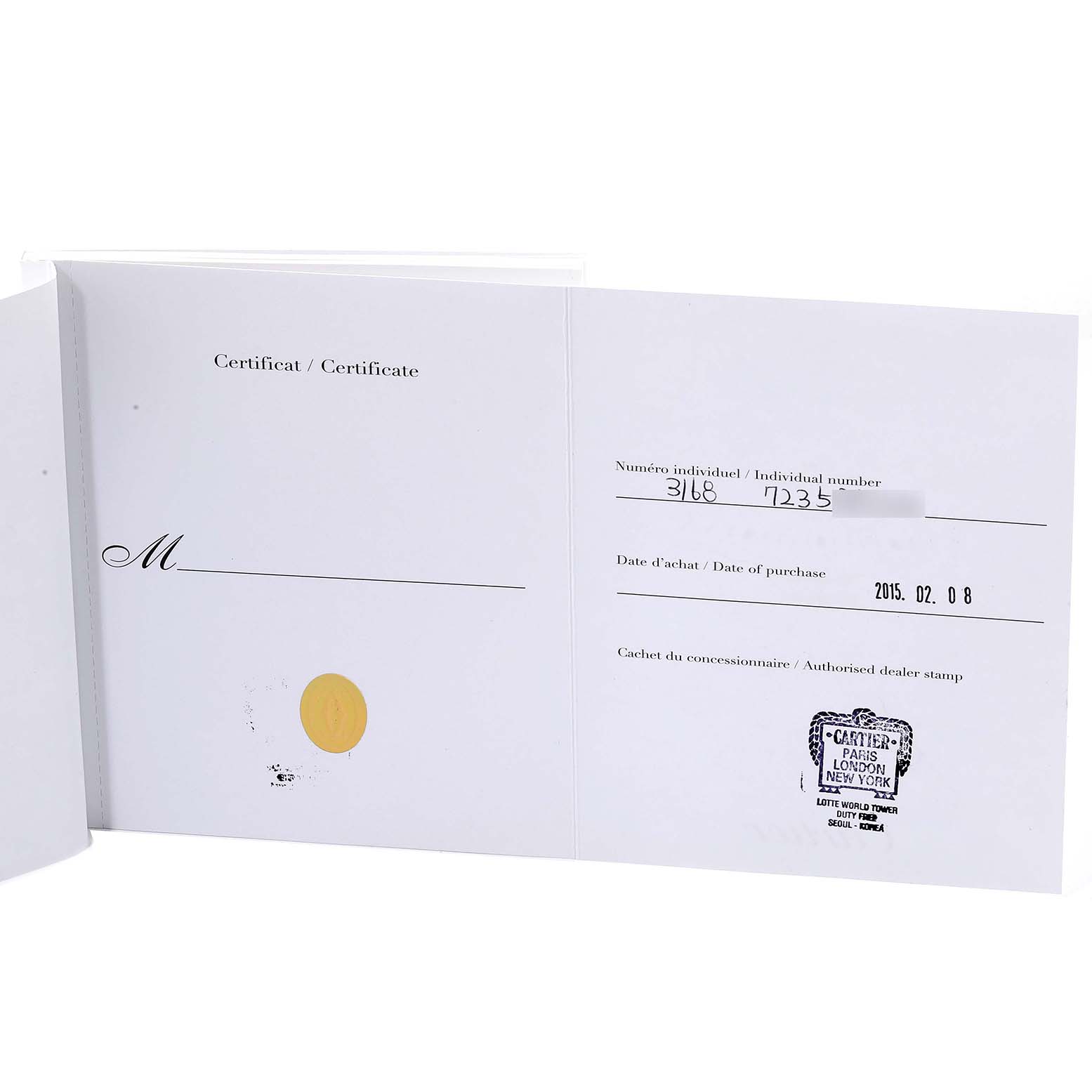 The image shows the certificate inside a booklet for the Cartier Tank Solo W5200002 Women
s Steel and Gold (two tone) Silver Dial W5200002 Women
s Steel and Gold (two tone) Silver Dial watch, displaying purchase date and dealer stamp.