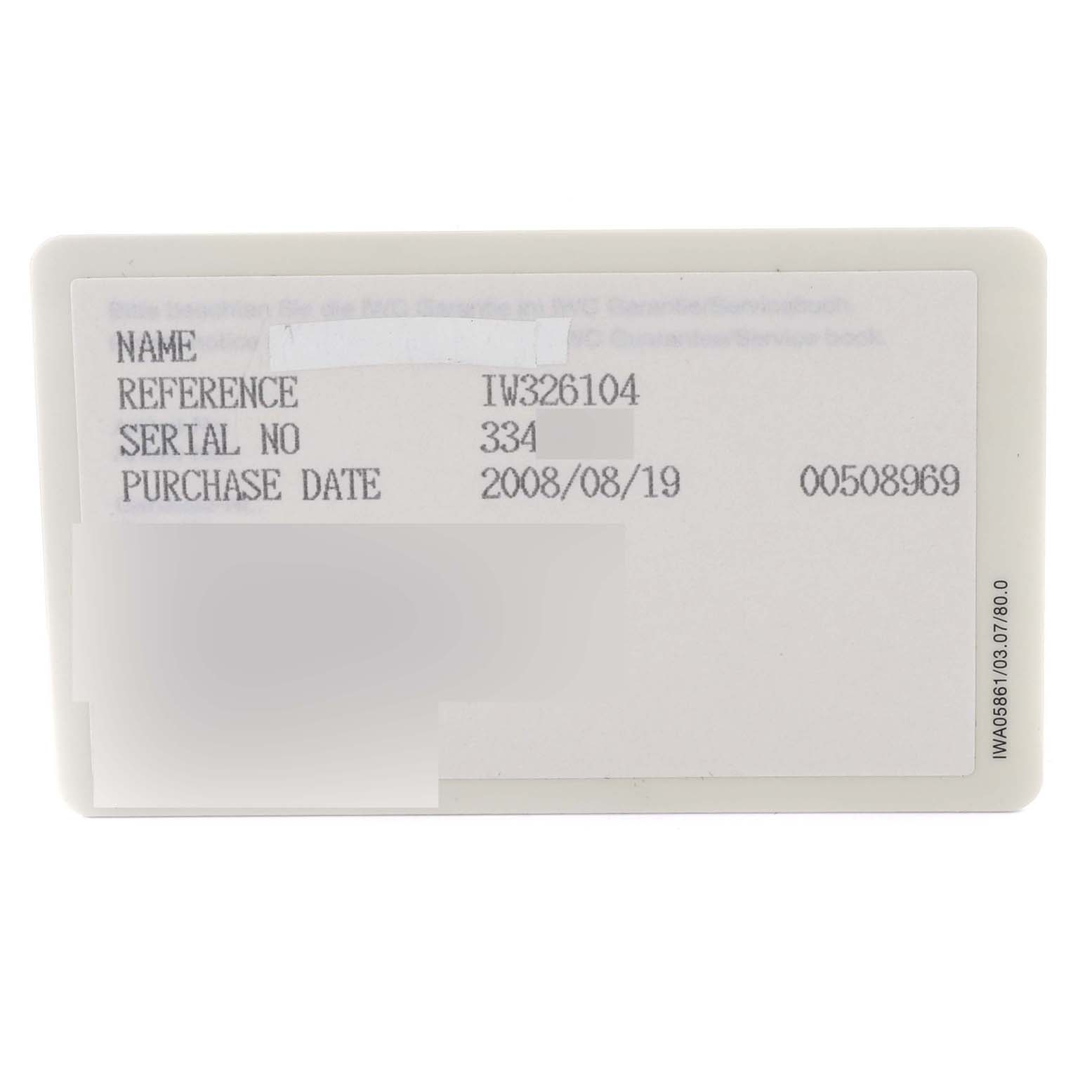 This image shows the warranty card for the IWC Pilot IW326104 Men's Stainless Steel Brown Dial IW326104 Men's Stainless Steel Brown Dial model watch, detailing reference number, serial number, and purchase date.