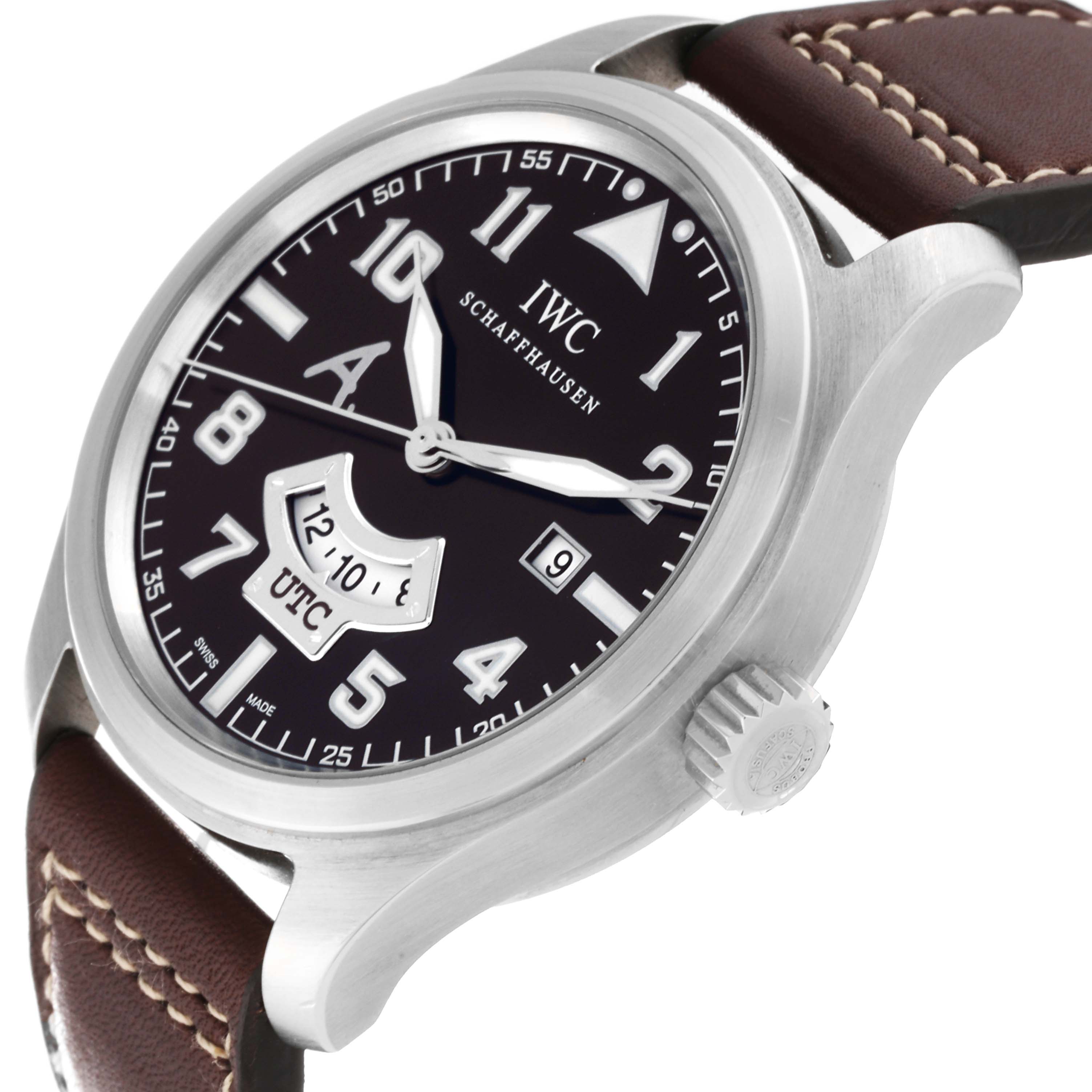 This image shows a close-up side view of the IWC Pilot IW326104 Men's Stainless Steel Brown Dial IW326104 Men's Stainless Steel Brown Dial watch, highlighting the face, case, crown, and leather strap.