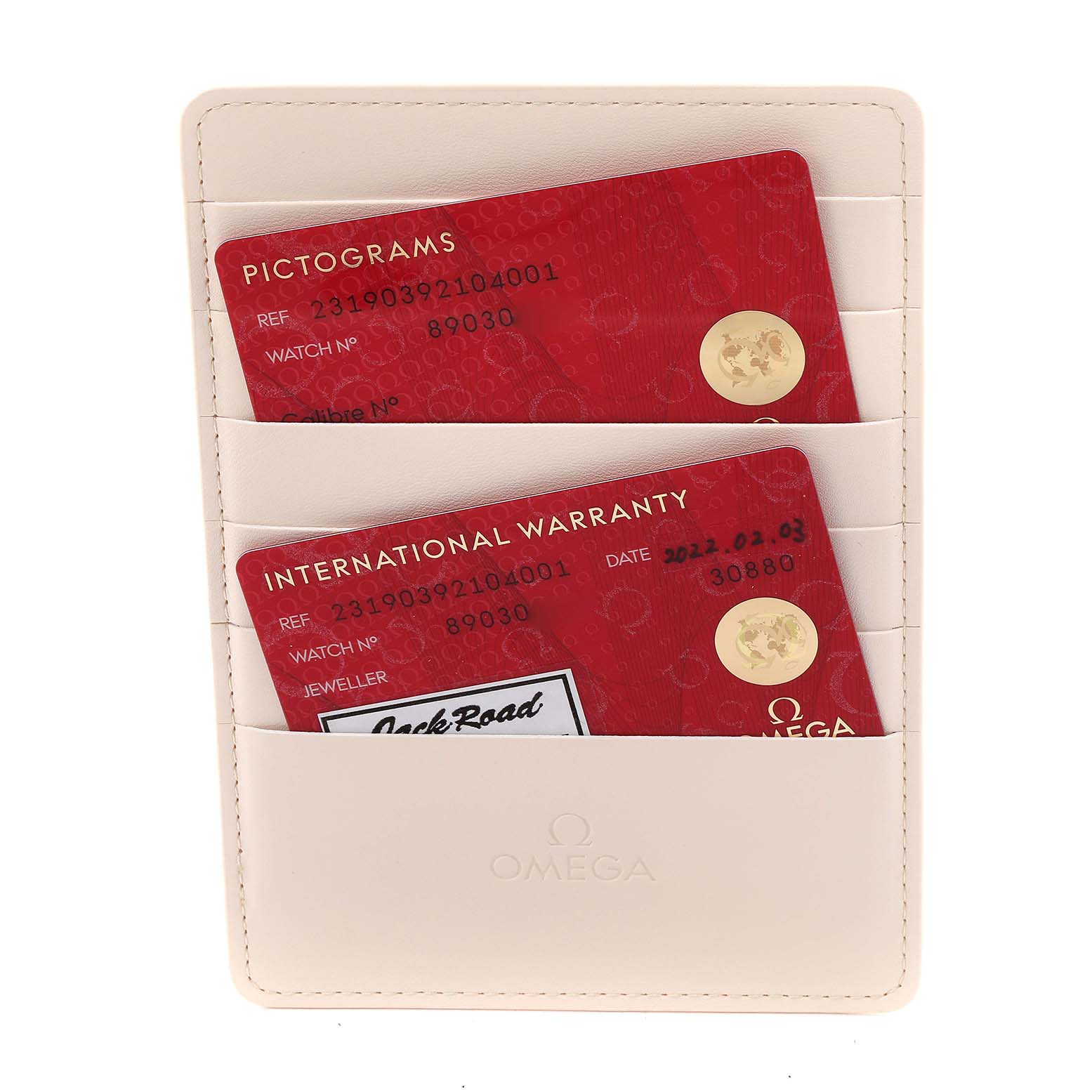 The image shows Pictograms and International Warranty cards for the Omega Aqua Terra 231.90.39.21.04.001 Men's Titanium White Dial 231.90.39.21.04.001 Men's Titanium White Dial, in a cream card holder.