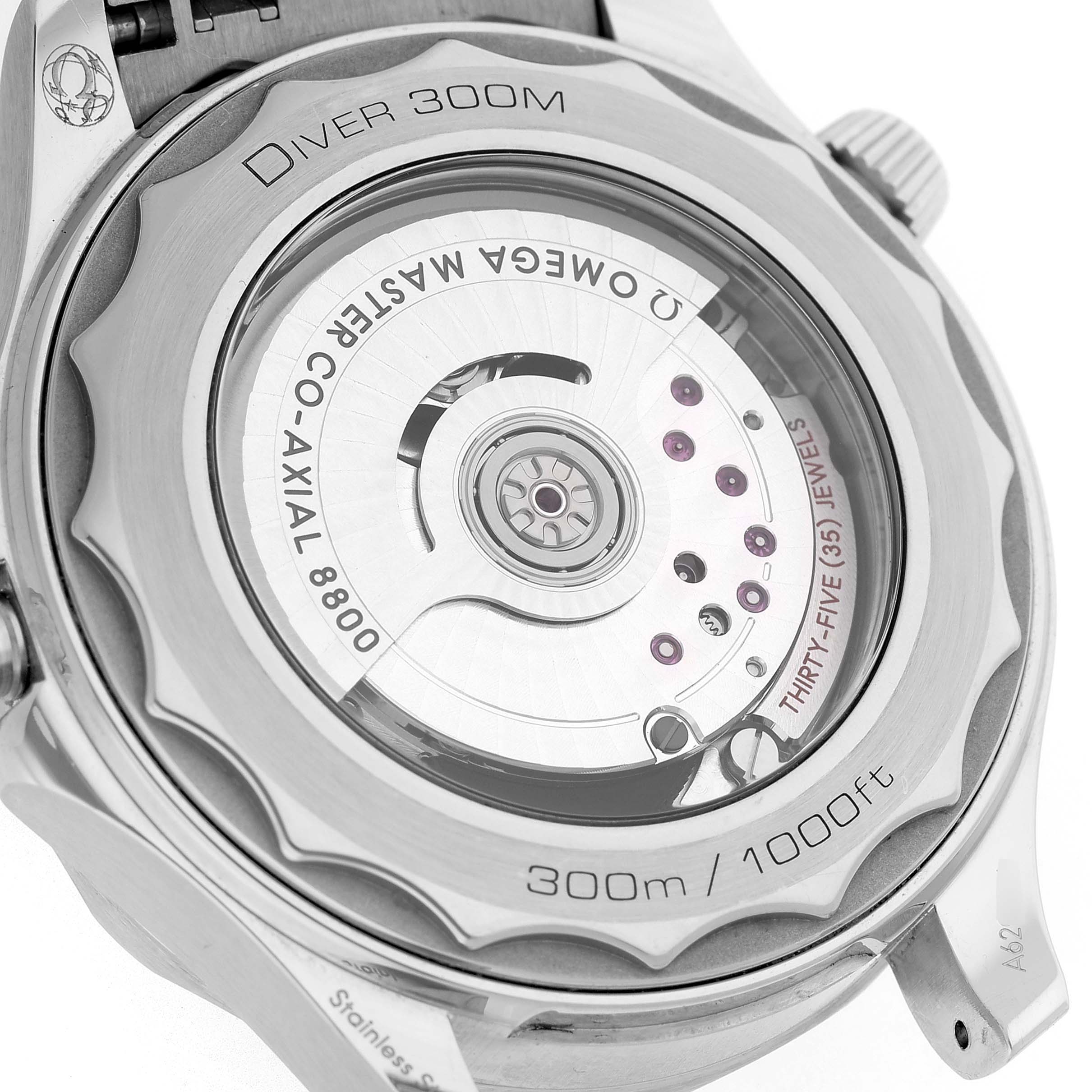 The image shows the back of the Omega Seamaster 210.32.42.20.04.001 Men's Stainless Steel White Dial, revealing the movement through a transparent case back.