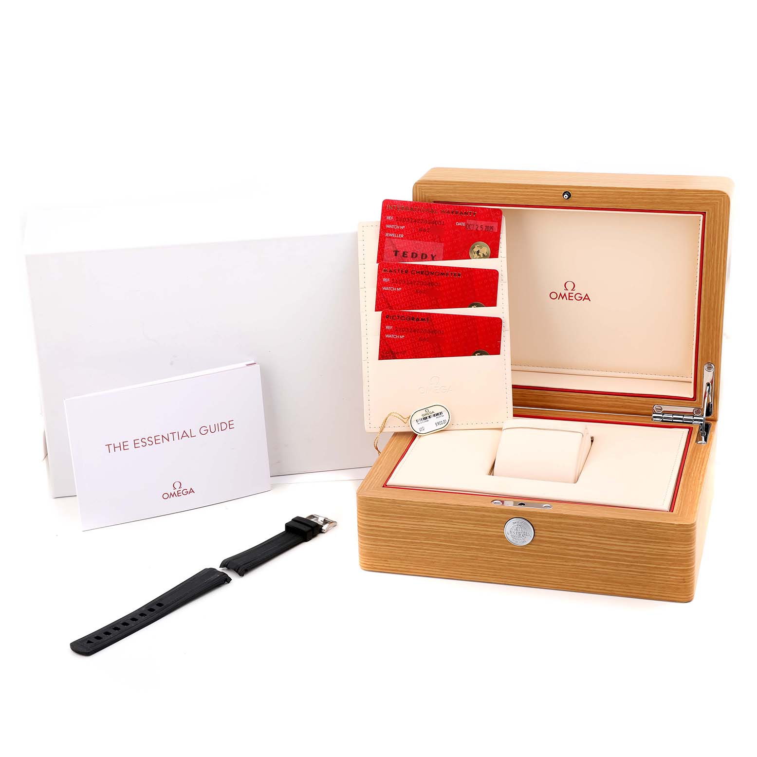 The image shows an Omega Seamaster 210.32.42.20.04.001 Men's Stainless Steel White Dial watch box, warranty cards, essential guide, and a black strap, viewed from the front.