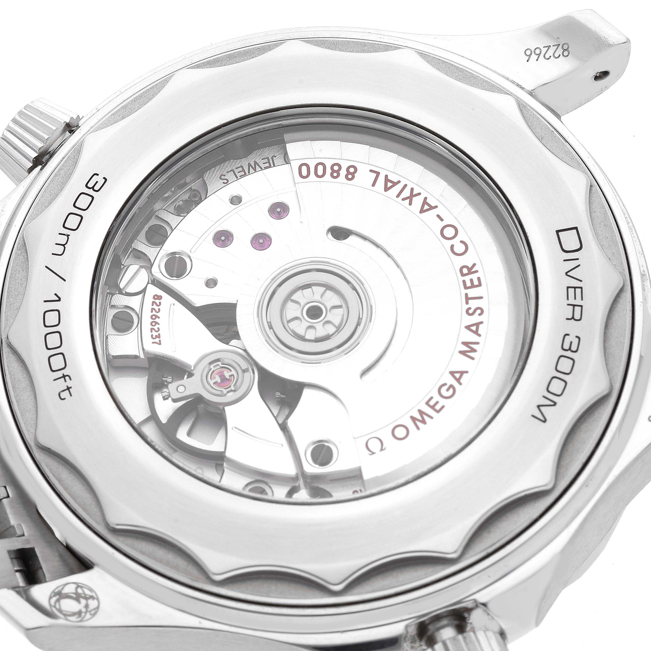 The image shows the back of an Omega Seamaster 210.30.42.20.03.001 Men's Stainless Steel Blue Dial 210.30.42.20.03.001 Men's Stainless Steel Blue Dial Diver 300M watch, highlighting the Omega Master Co-Axial 8800 movement.