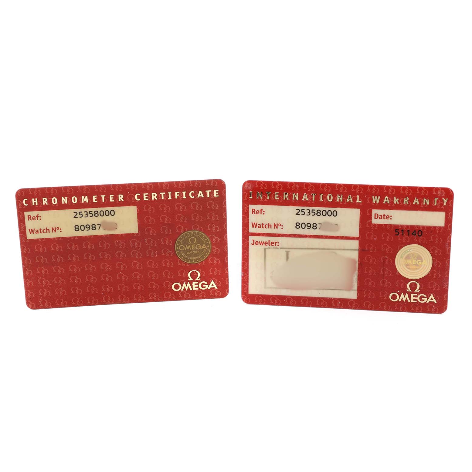The image shows two red Omega cards: a Chronometer Certificate and an International Warranty for a Seamaster model.
