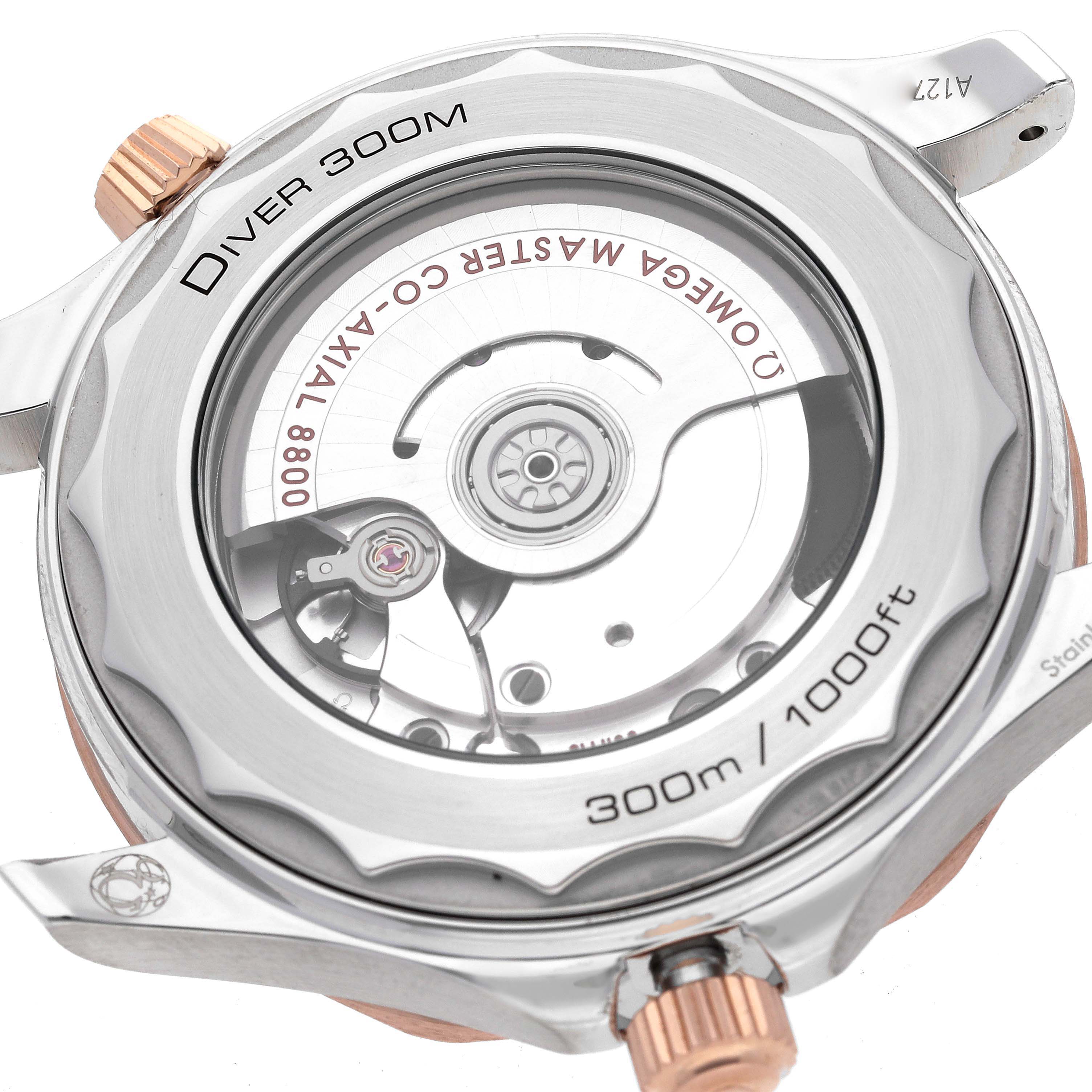 This image shows the back of the Omega Seamaster 210.22.42.20.01.002 Men's Steel and Gold (two tone) Black Dial 210.22.42.20.01.002 Men's Steel and Gold (two tone) Black Dial Diver 300m watch, highlighting its movement and case.