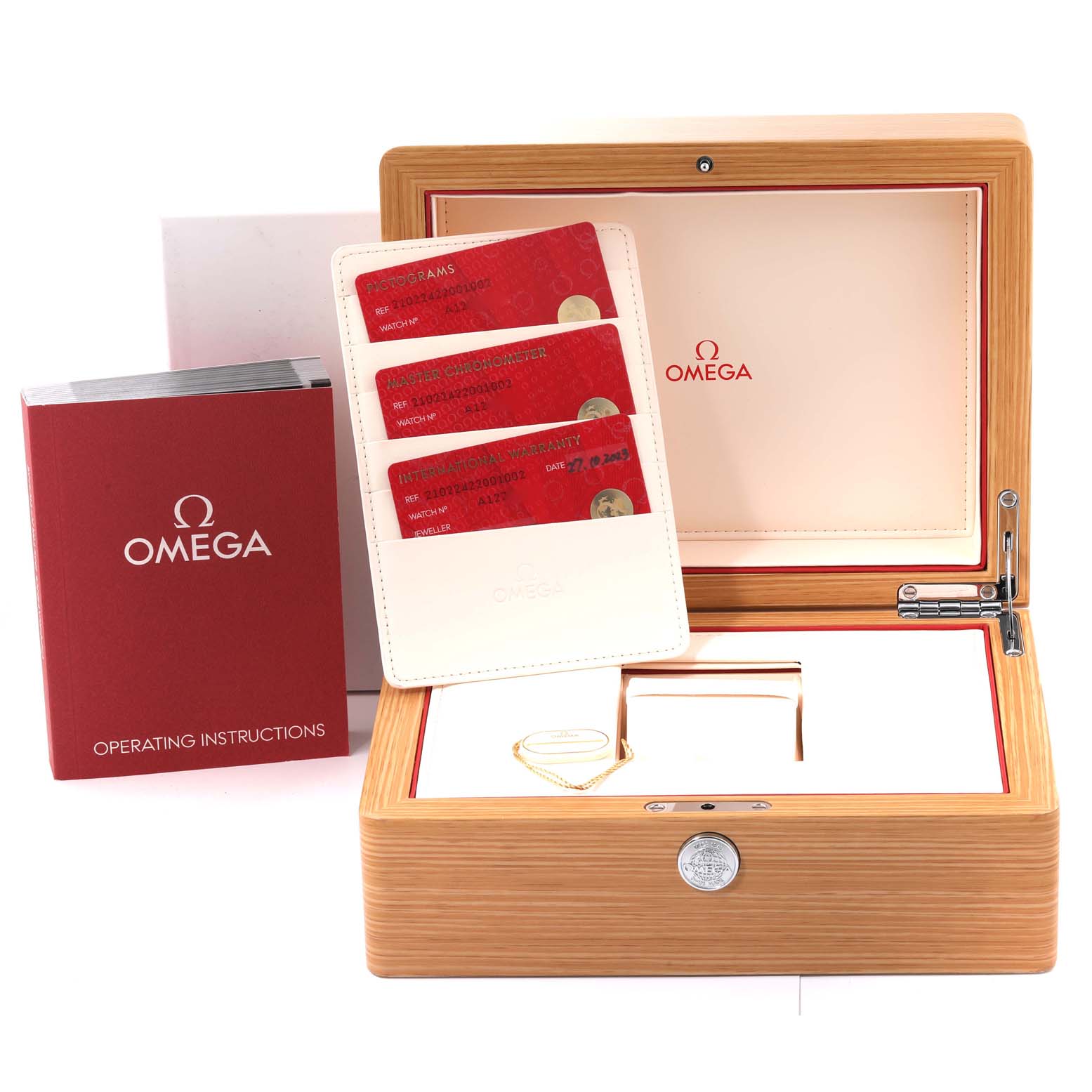 The image shows the packaging, warranty cards, and operating instructions for an Omega Seamaster 210.22.42.20.01.002 Men's Steel and Gold (two tone) Black Dial 210.22.42.20.01.002 Men's Steel and Gold (two tone) Black Dial watch.