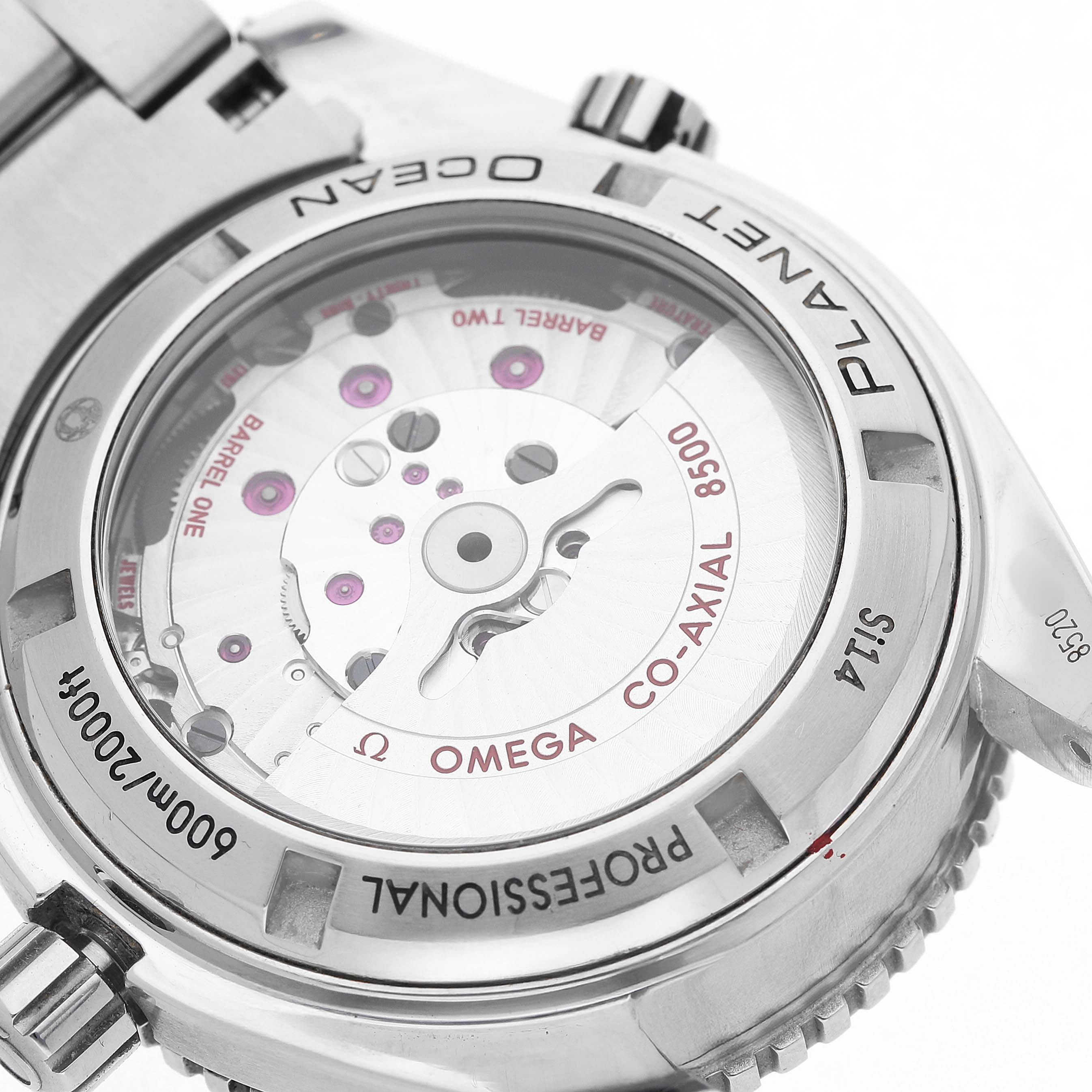 The image shows the rear view of the Omega Seamaster 232.30.42.21.04.001 Men's Stainless Steel White Dial, highlighting its Co-Axial movement through a transparent case back.