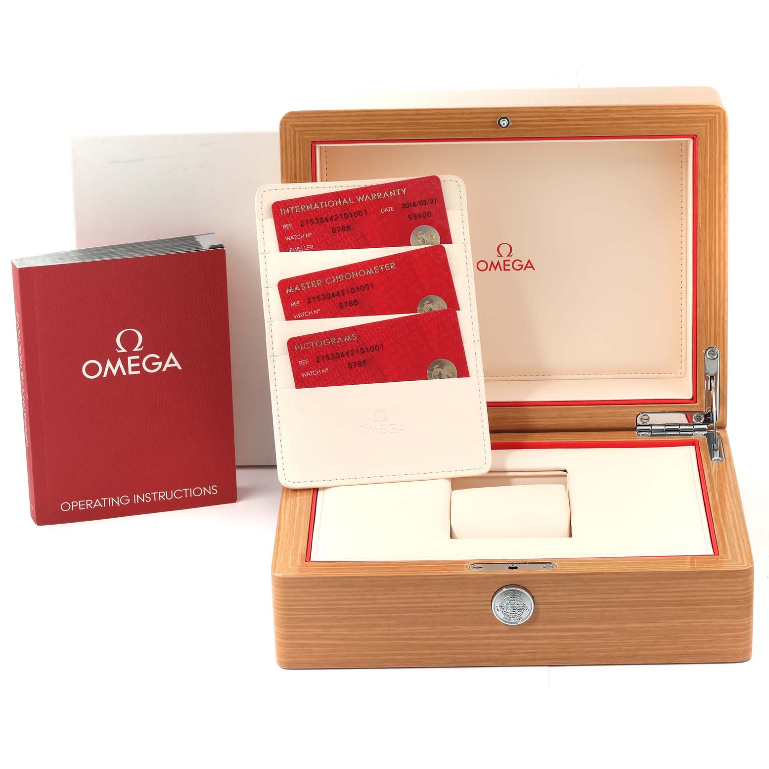 The image shows the packaging and accessories of the Omega Planet Ocean 215.30.44.21.01.001 Men
s Stainless Steel Black Dial 215.30.44.21.01.001 Men
s Stainless Steel Black Dial watch, including the box, warranty cards, and the operating instructions.