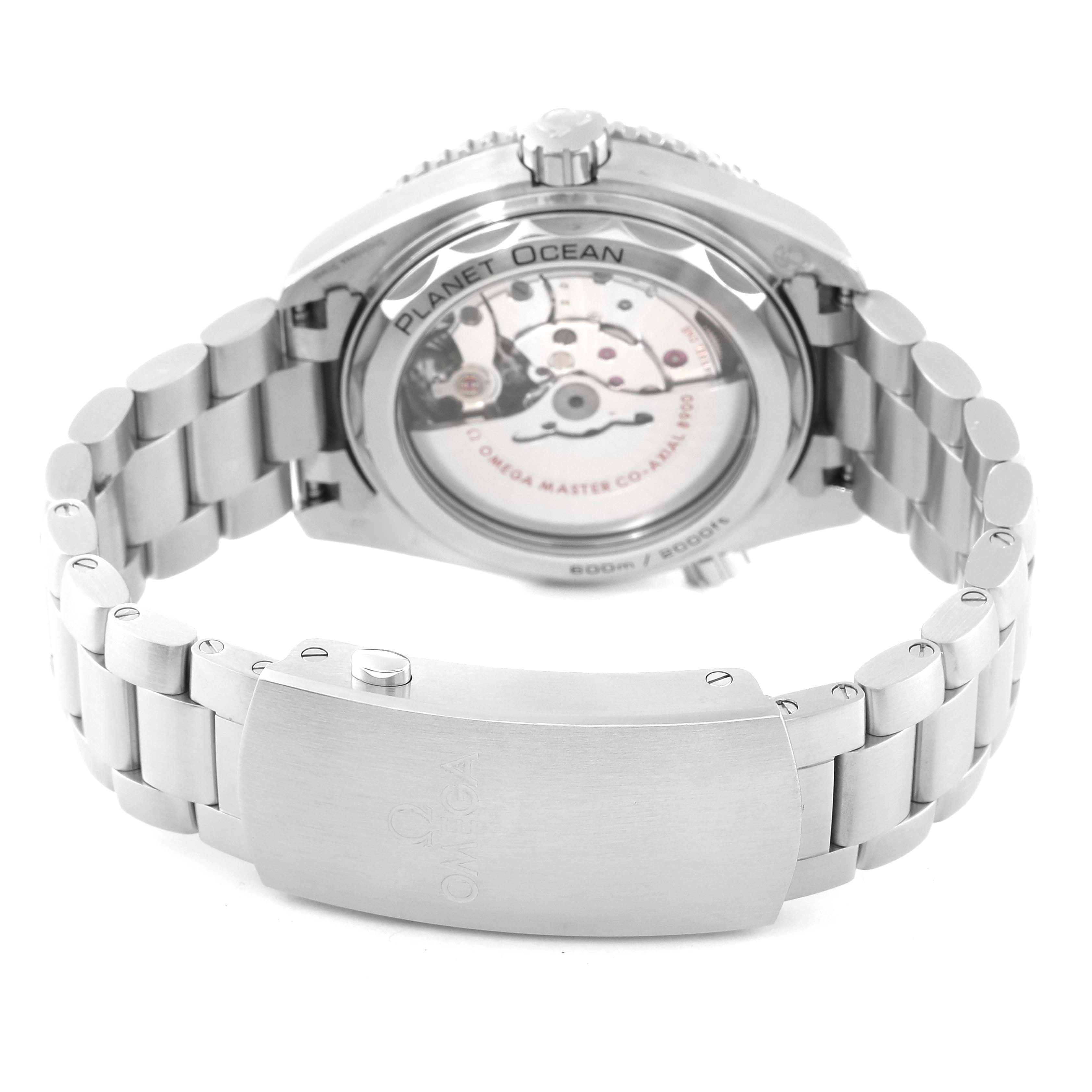 The image shows the back view of the Omega Planet Ocean 215.30.44.21.01.001 Men
s Stainless Steel Black Dial 215.30.44.21.01.001 Men
s Stainless Steel Black Dial watch, highlighting the transparent case back and metal bracelet.