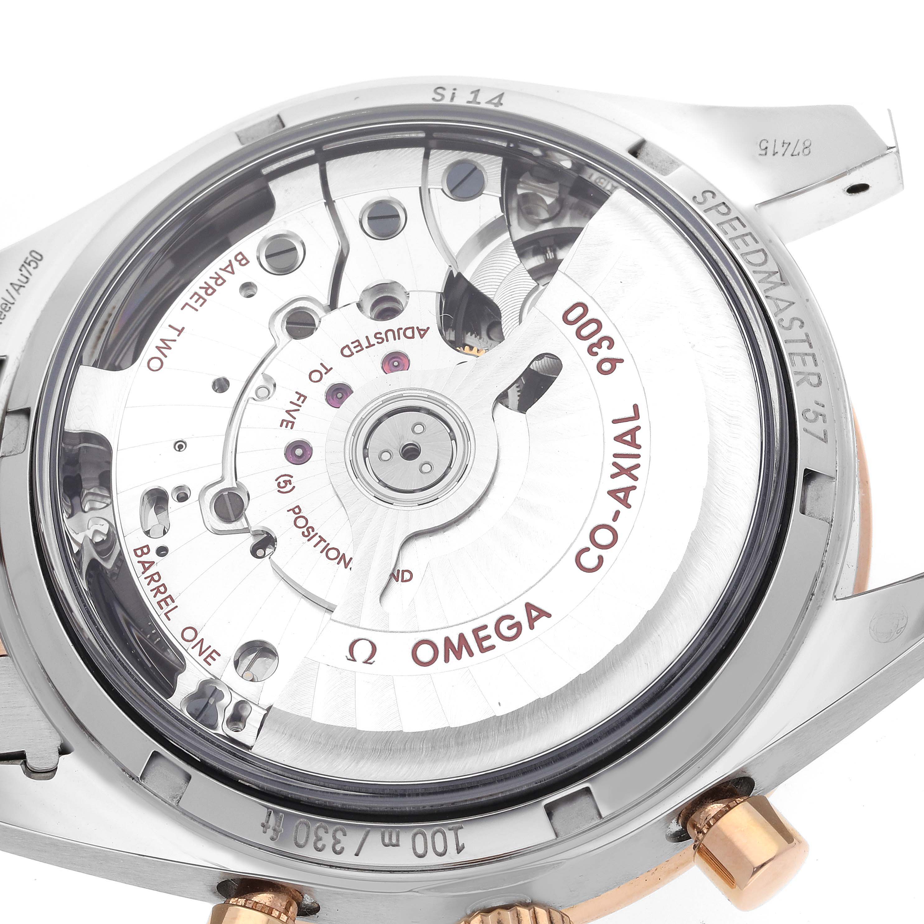 The image shows the back view of the Omega Speedmaster 331.20.42.51.01.002 Men's Steel and Gold (two tone) Black Dial 331.20.42.51.01.002 Men's Steel and Gold (two tone) Black Dial, highlighting its Co-Axial 9300 movement.