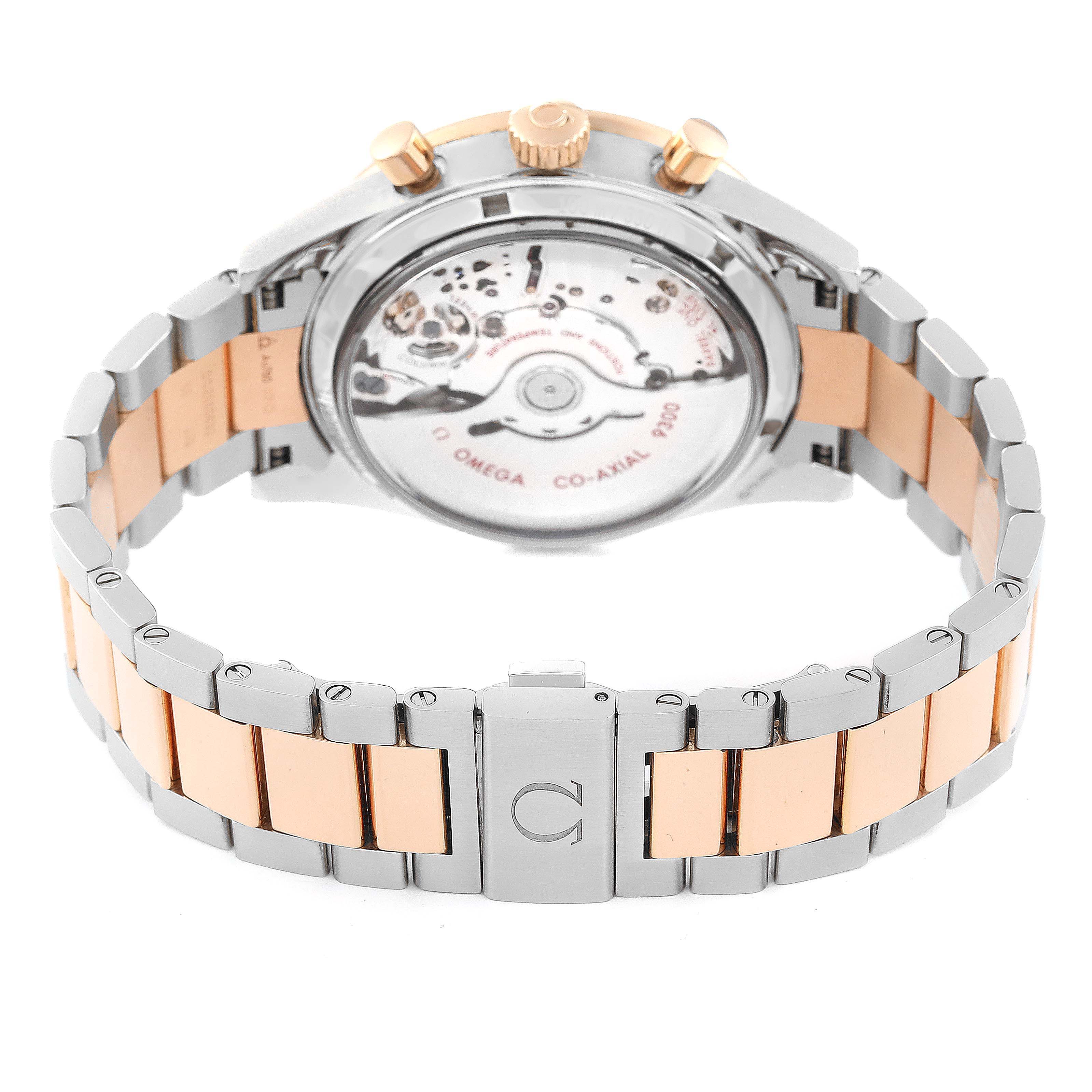 The image shows the back view of the Omega Speedmaster 331.20.42.51.01.002 Men's Steel and Gold (two tone) Black Dial 331.20.42.51.01.002 Men's Steel and Gold (two tone) Black Dial watch highlighting its movement and the two-toned metal bracelet.