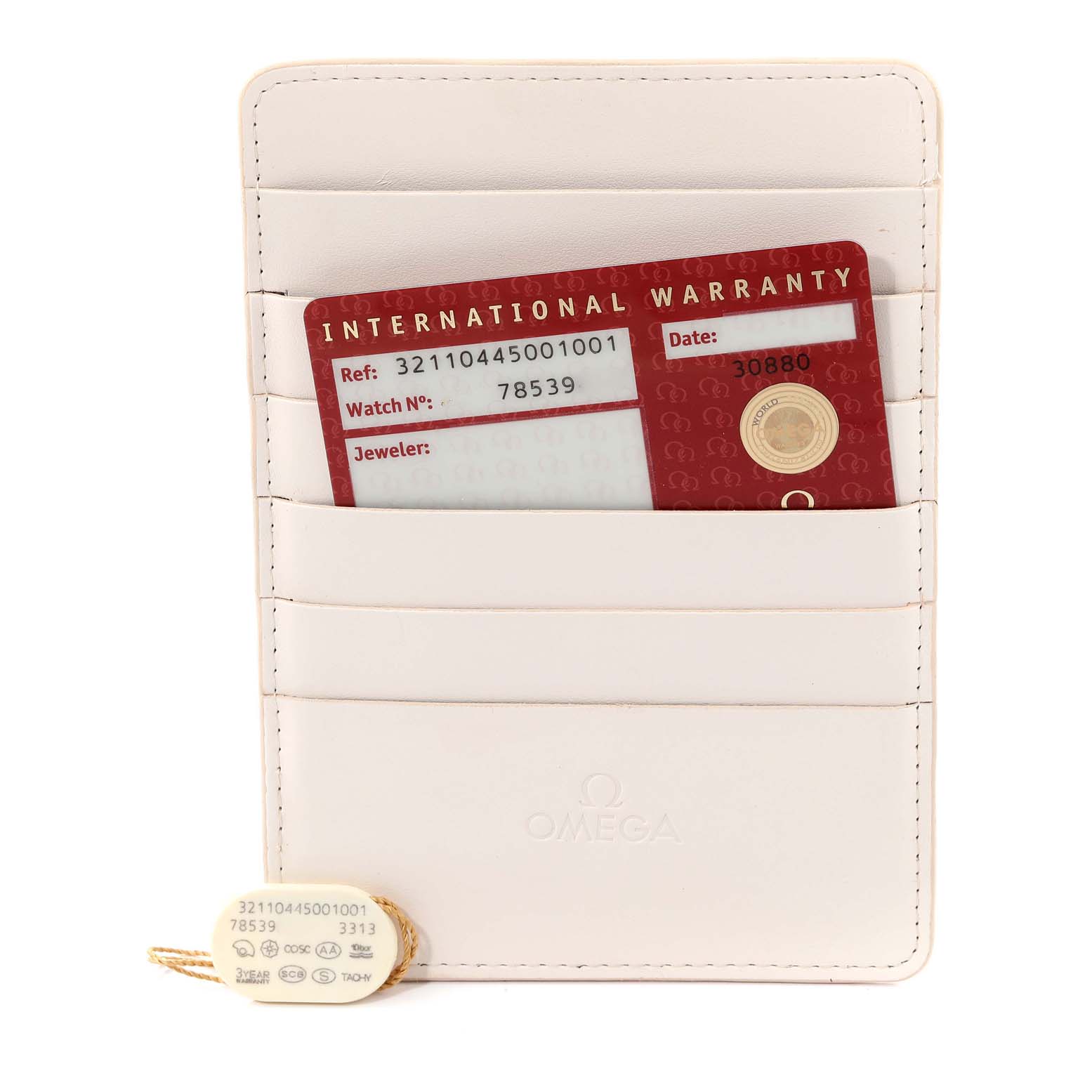 The image shows an Omega Speedmaster 321.10.44.50.01.001 Men's Stainless Steel Black Dial 321.10.44.50.01.001 Men's Stainless Steel Black Dial's international warranty card and tag along with a holder.