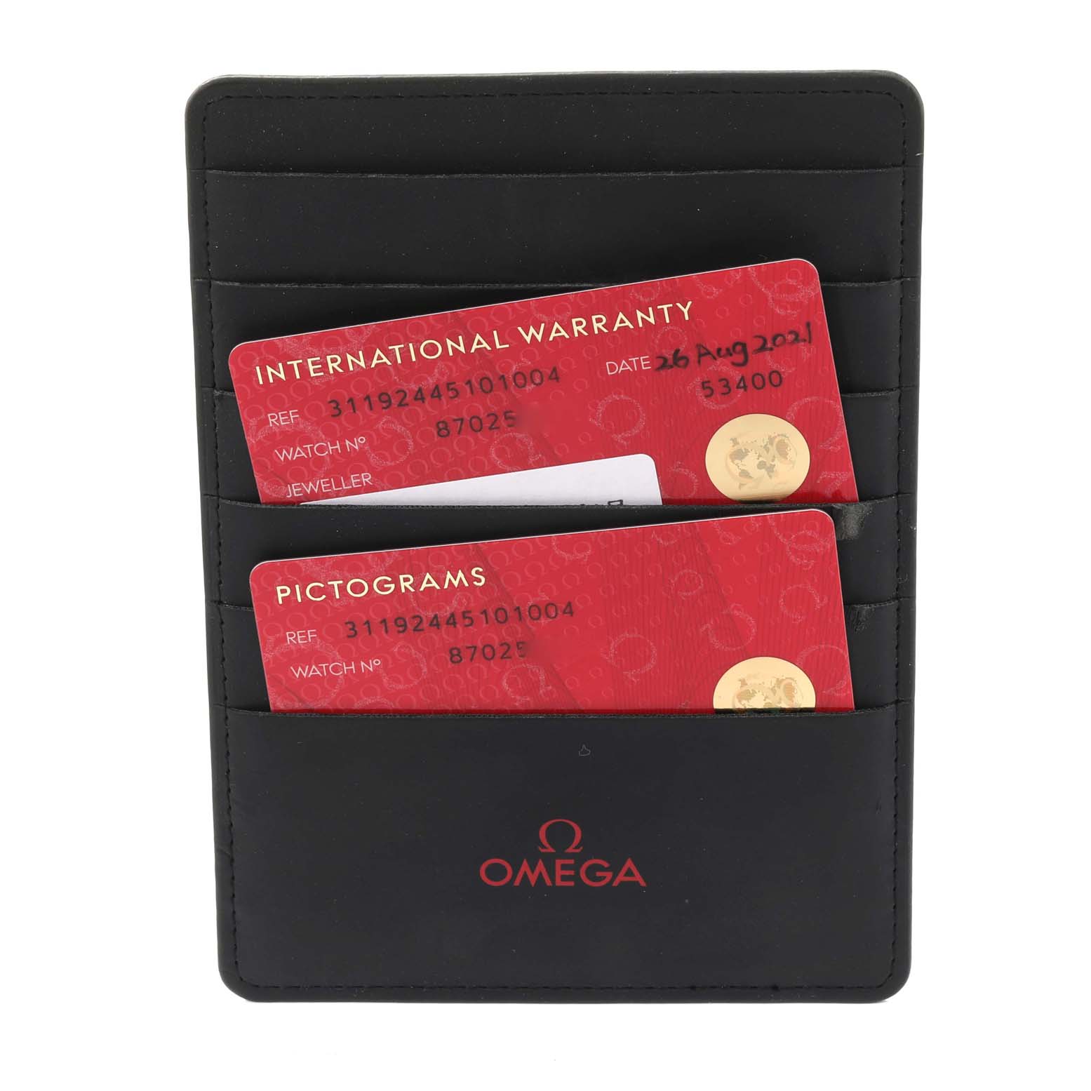 The image shows an Omega Speedmaster 311.92.44.51.01.004 Men's Ceramic Black Dial 311.92.44.51.01.004 Men's Ceramic Black Dial's cardholder with international warranty and pictogram cards inside.