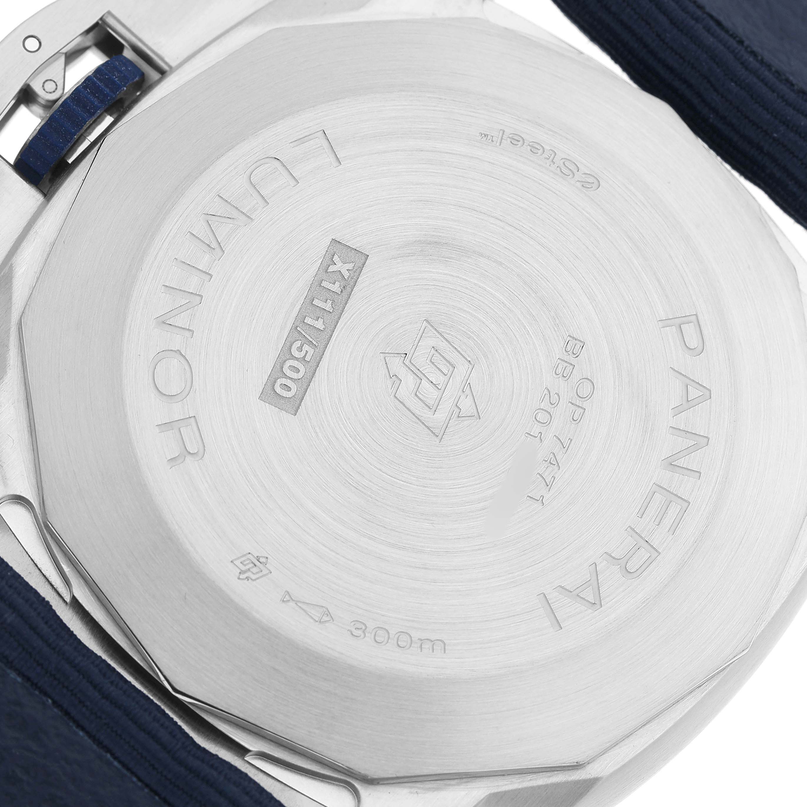 The image shows the back of the Panerai Luminor PAM01157 Men's Stainless Steel Blue Dial watch, highlighting the caseback and surrounding elements.
