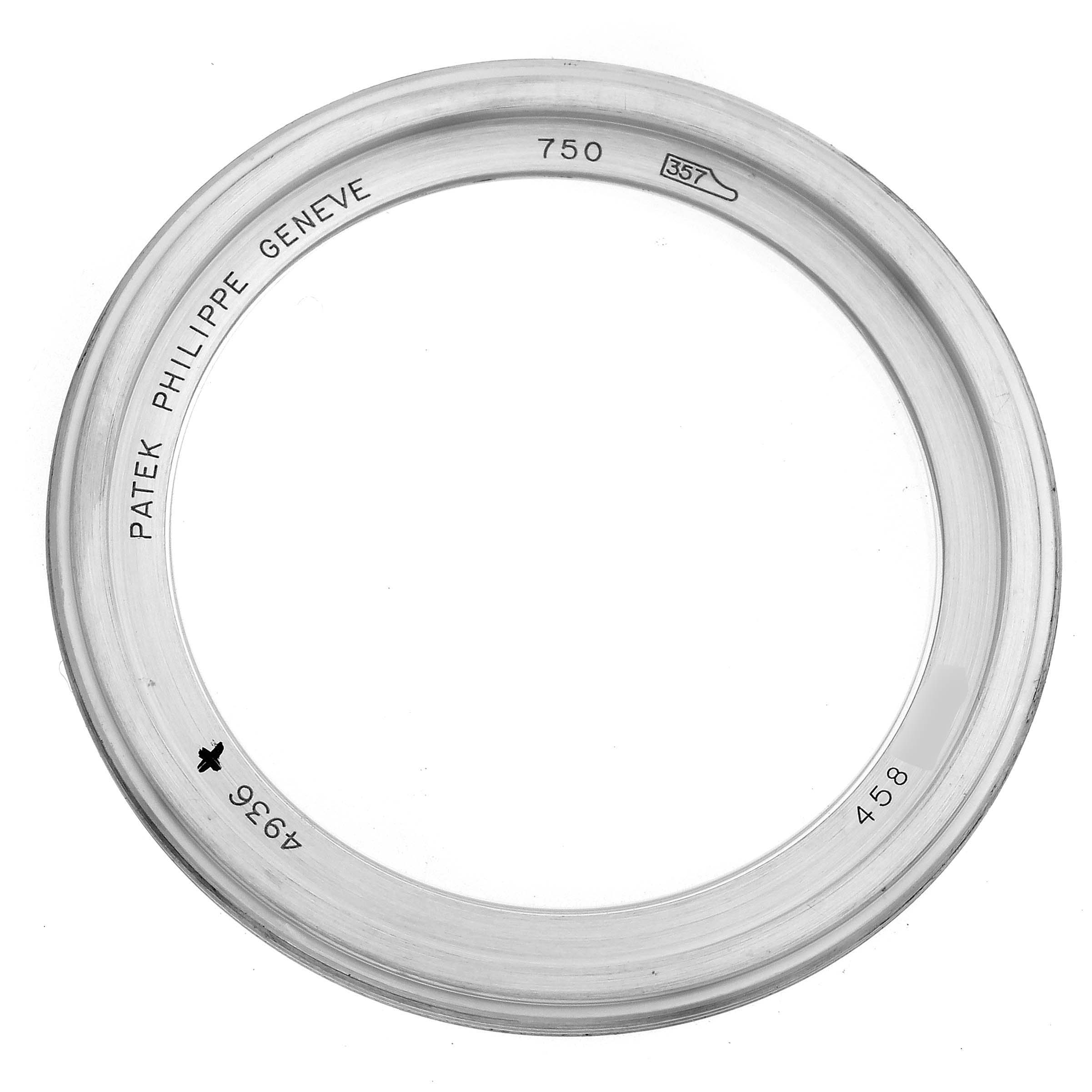 The image shows a bezel for the Patek Philippe Complications 4936G - 001 Men's White Gold Mother of Pearl Dial 4936G - 001 Men's White Gold Mother of Pearl Dial model, viewed from the front.