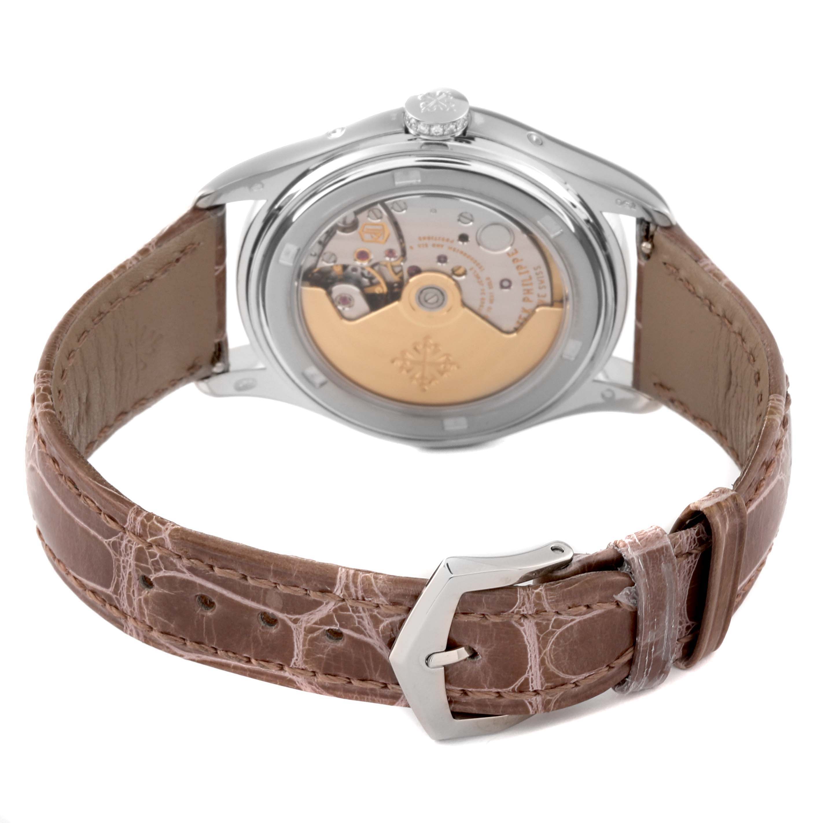 The image shows a rear angle of the Patek Philippe Complications 4936G - 001 Men's White Gold Mother of Pearl Dial 4936G - 001 Men's White Gold Mother of Pearl Dial watch, highlighting its movement and leather strap.