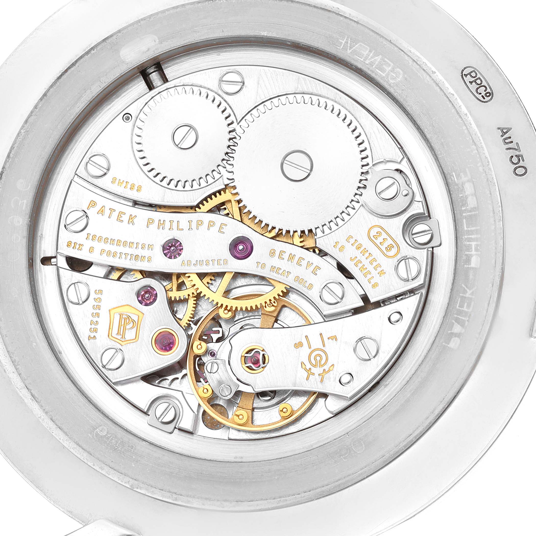 The image shows the back view of the Patek Philippe Calatrava 5119G-001 Men's White Gold White Dial 5119G-001 Men's White Gold White Dial watch, featuring its exposed mechanical movement.