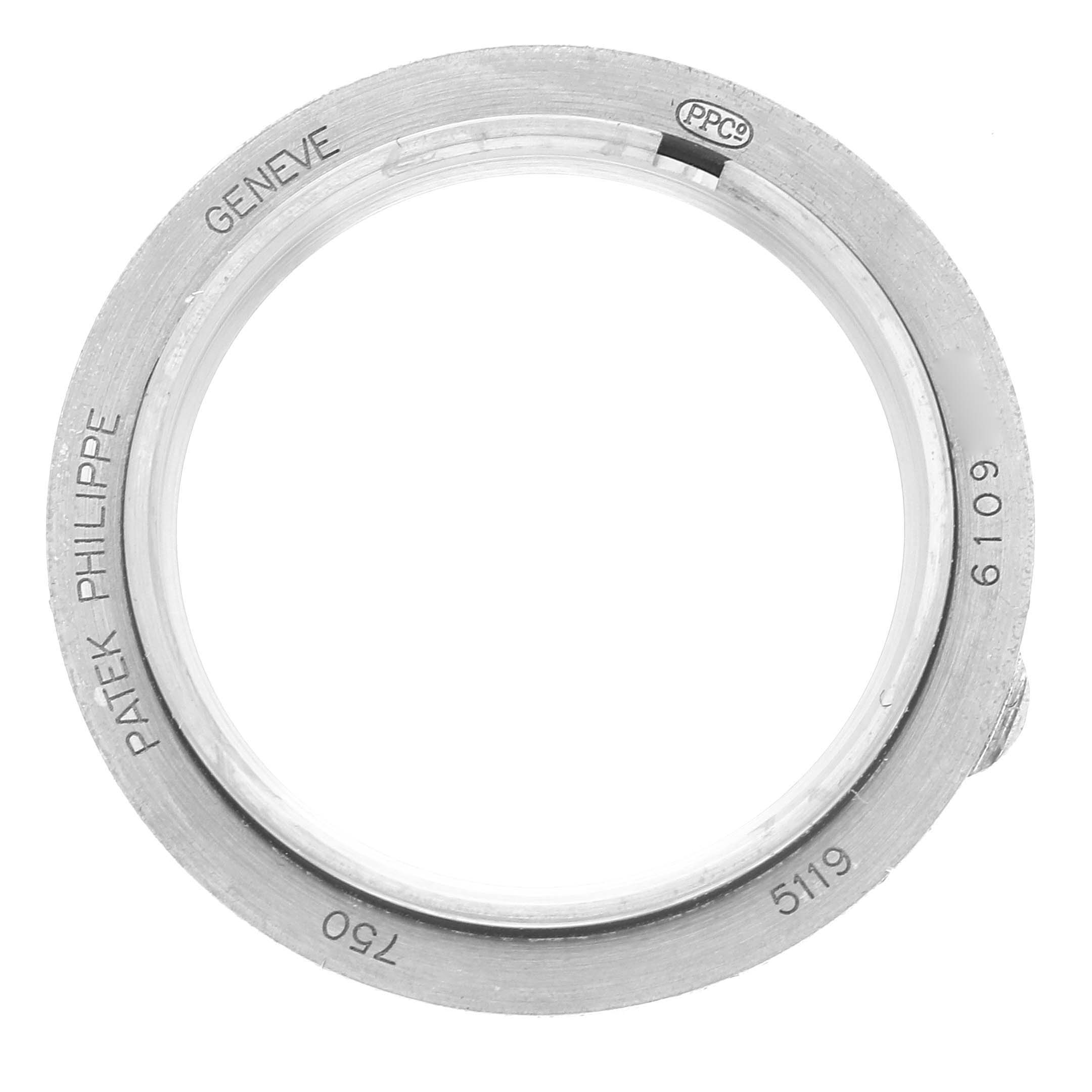 The image shows an overhead angle of a watch bezel for the Patek Philippe Calatrava 5119G-001 Men's White Gold White Dial 5119G-001 Men's White Gold White Dial model.