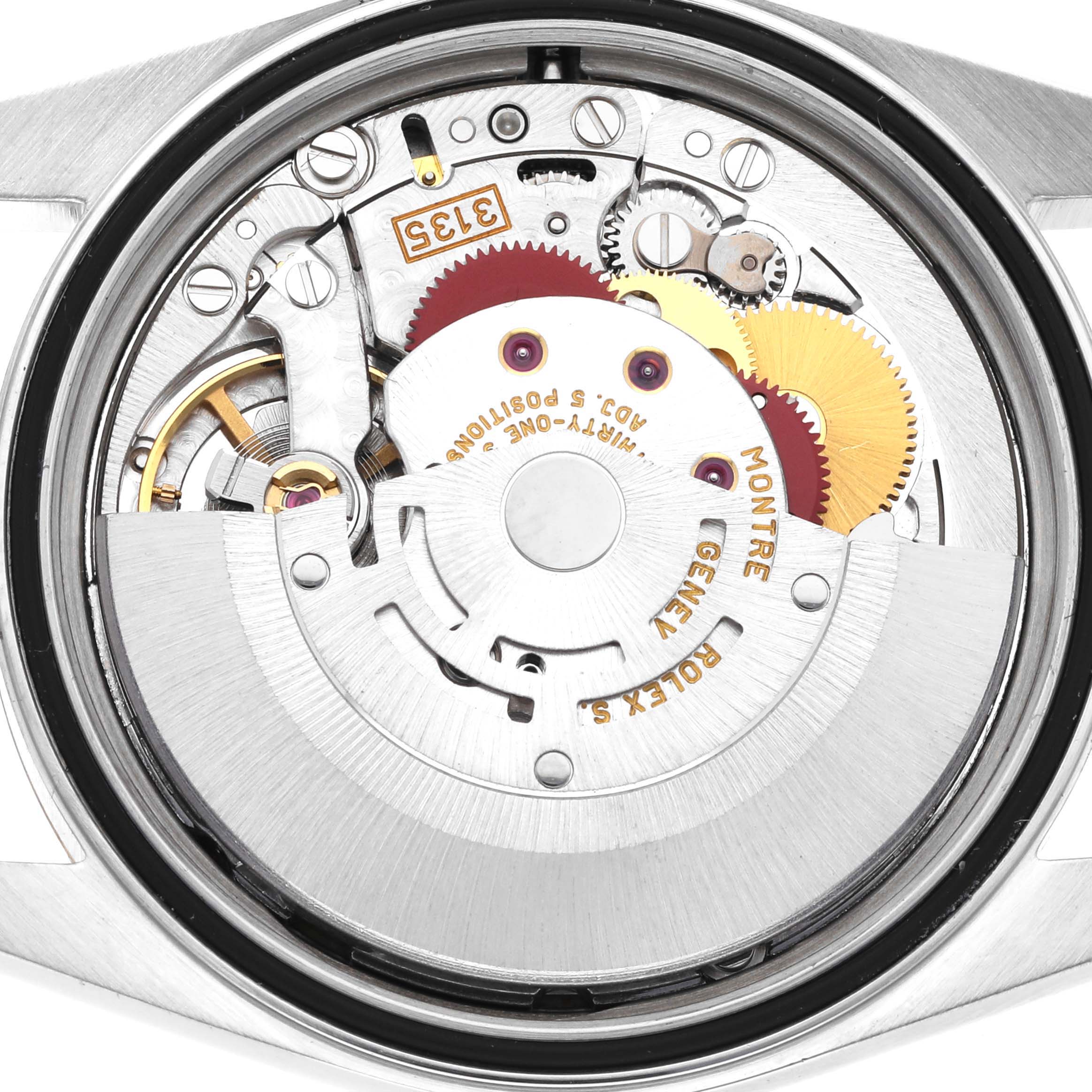 The image shows a close-up of the movement inside the Rolex Datejust 16233 Men's Steel and Gold (two tone) Champagne Dial 16233 Men's Steel and Gold (two tone) Champagne Dial, highlighting gears and internal mechanisms.