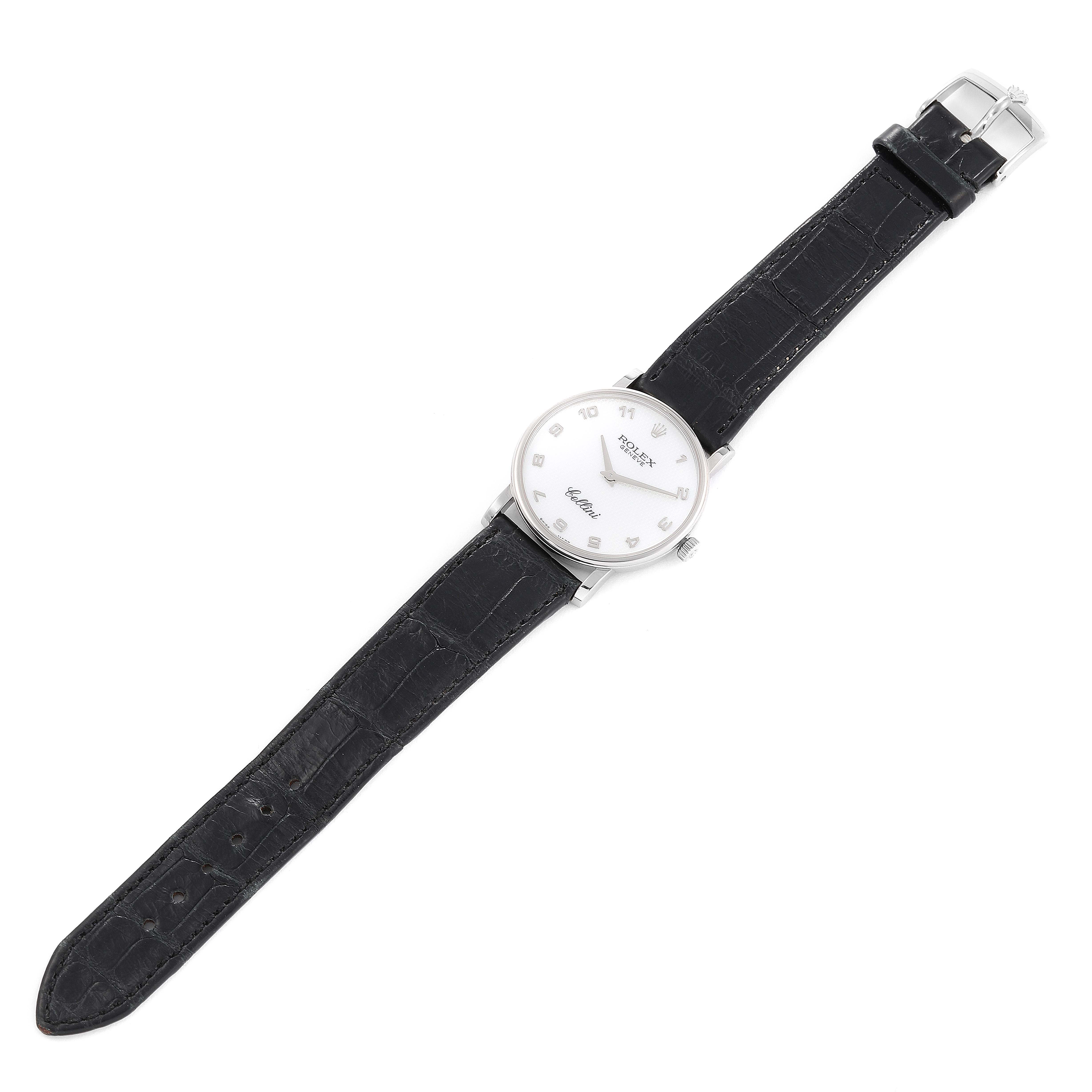 This image shows a Rolex Cellini 5115 Men
s Stainless Steel Mother of Pearl Dial 5115 Men
s Stainless Steel Mother of Pearl Dial watch from an overhead angle, displaying the face, case, crown, and full leather strap.