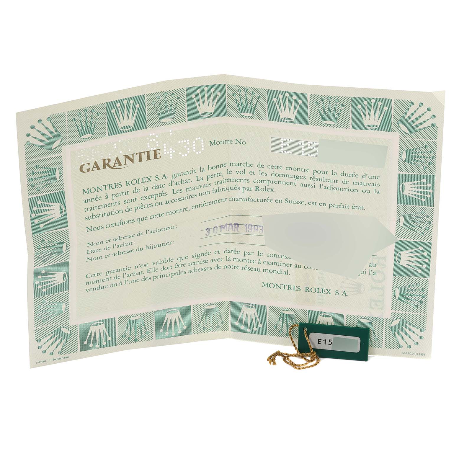 This image shows the official warranty papers and tag for a Rolex Cellini 6623/8 Men's Yellow Gold Champagne Dial 6623/8 Men's Yellow Gold Champagne Dial watch.