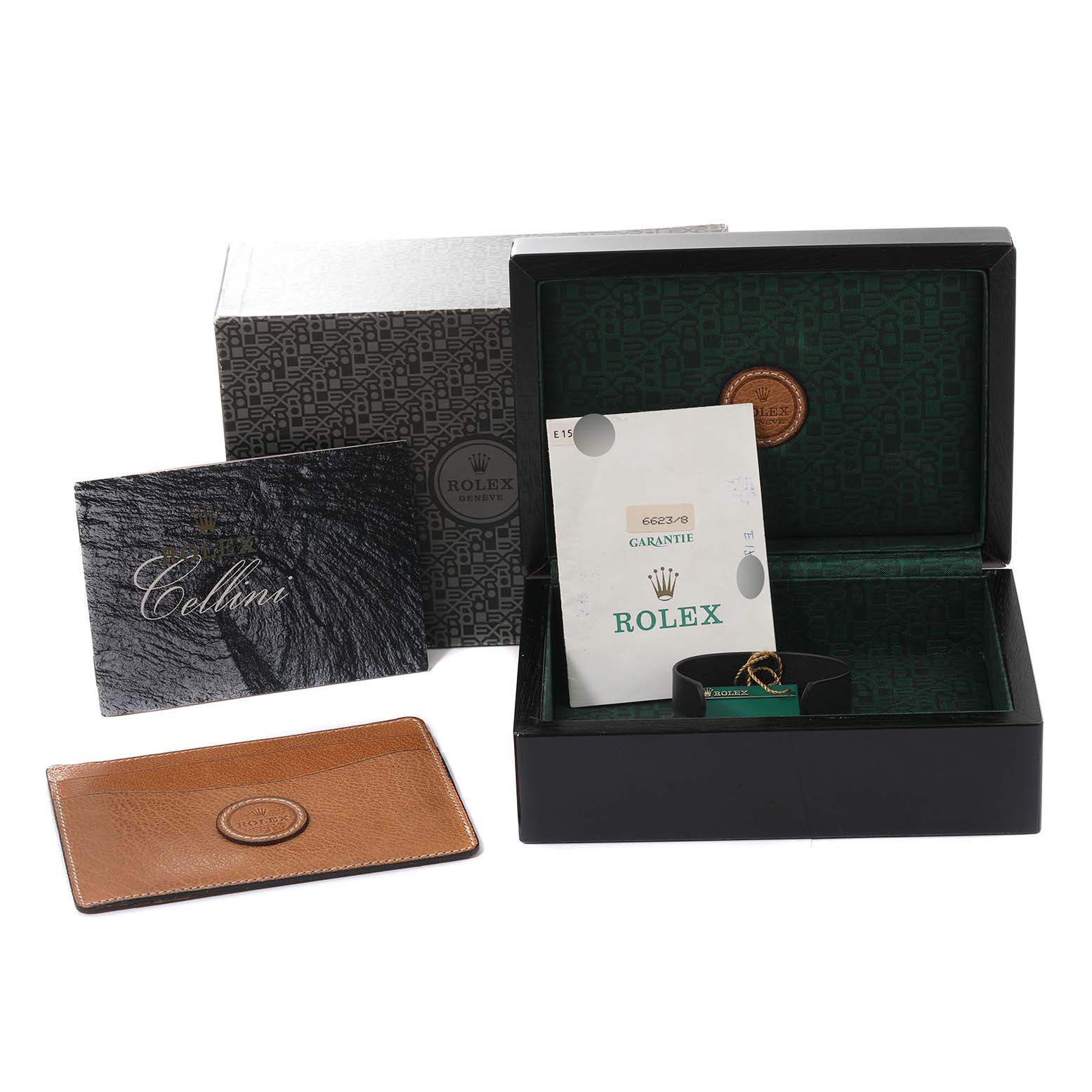 This image shows the packaging and accessories for a Rolex Cellini 6623/8 Men's Yellow Gold Champagne Dial 6623/8 Men's Yellow Gold Champagne Dial watch, including the box, warranty card, and manuals.