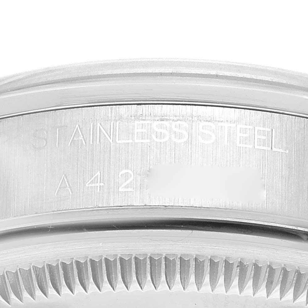 This close-up image shows the stainless steel caseback and serial number area of a Rolex Date 15200 Men's Stainless Steel Blue Dial 15200 Men's Stainless Steel Blue Dial model watch.